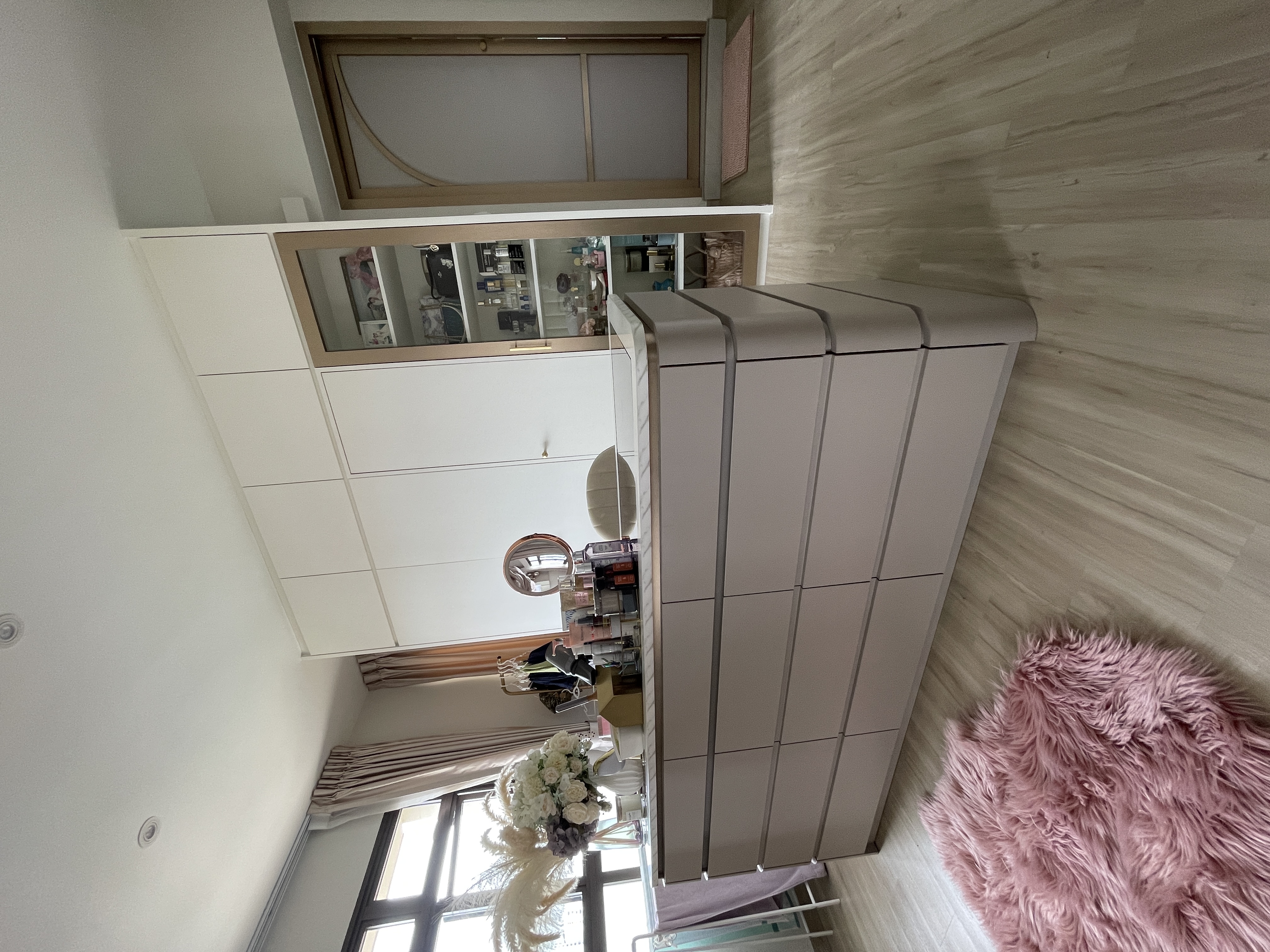 Modern luxe centrepiece curved vanity island in re-invented MBR