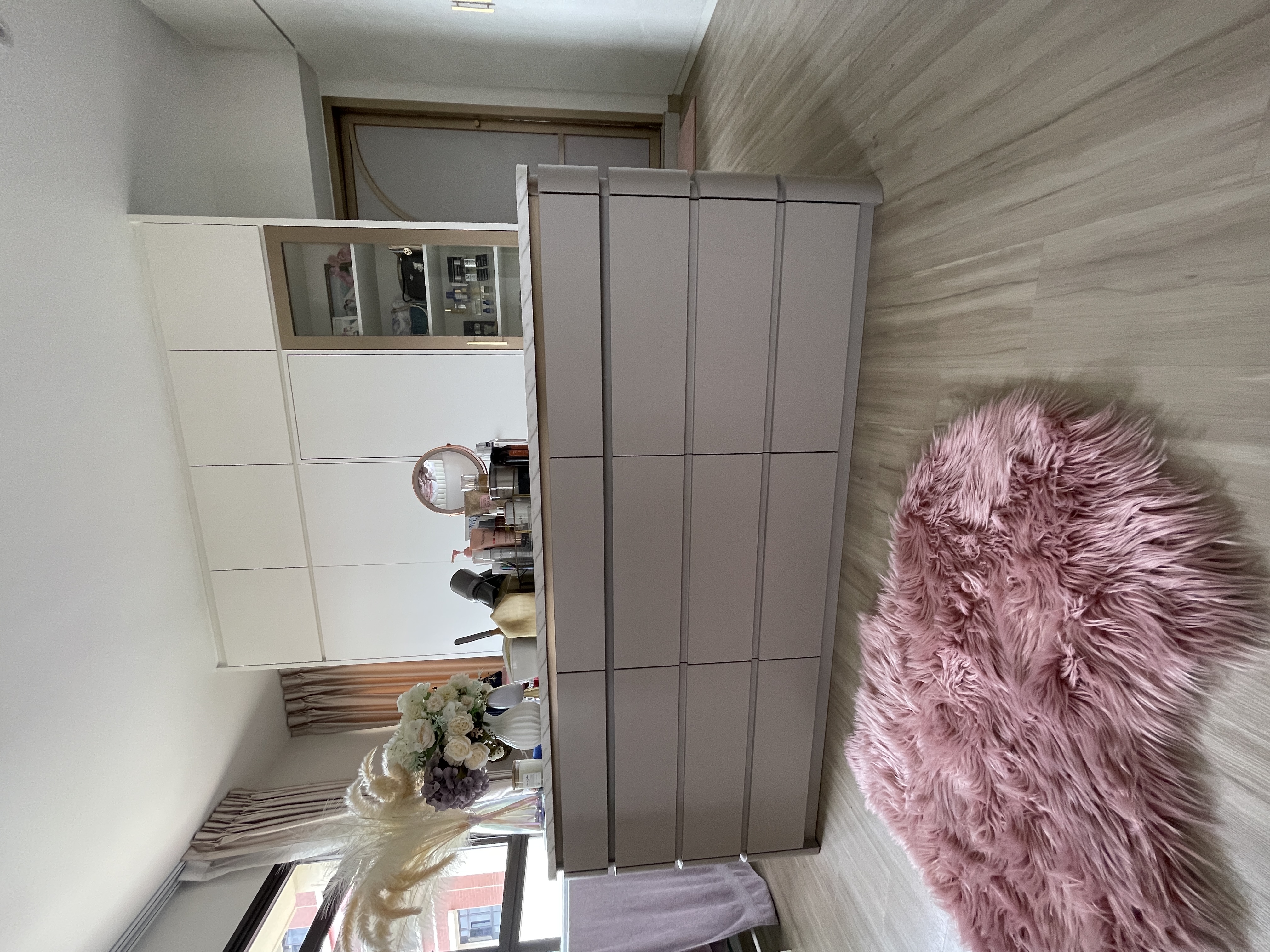 Modern luxe centrepiece curved vanity island in re-invented MBR