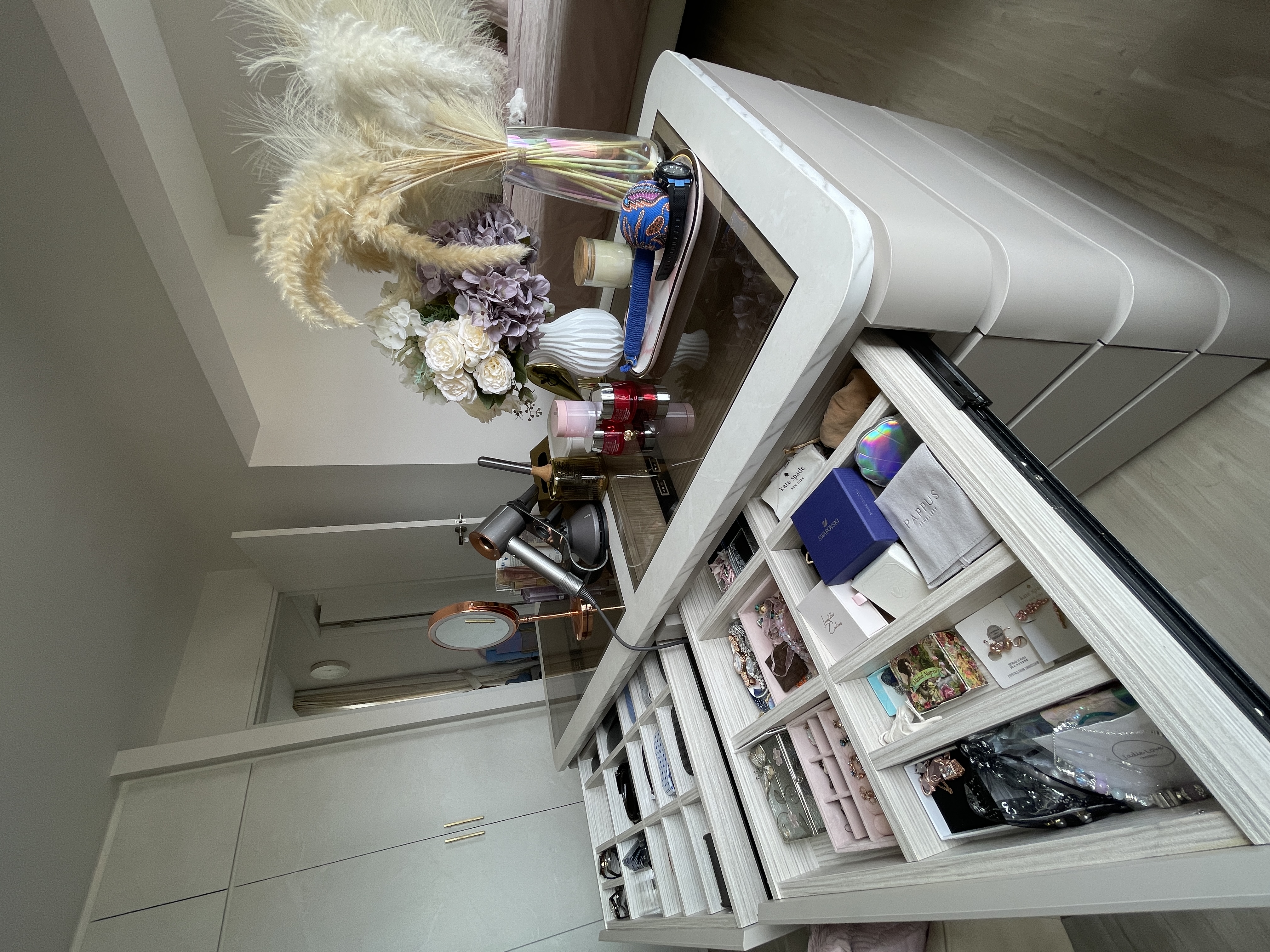 Modern luxe centrepiece curved vanity island in re-invented MBR