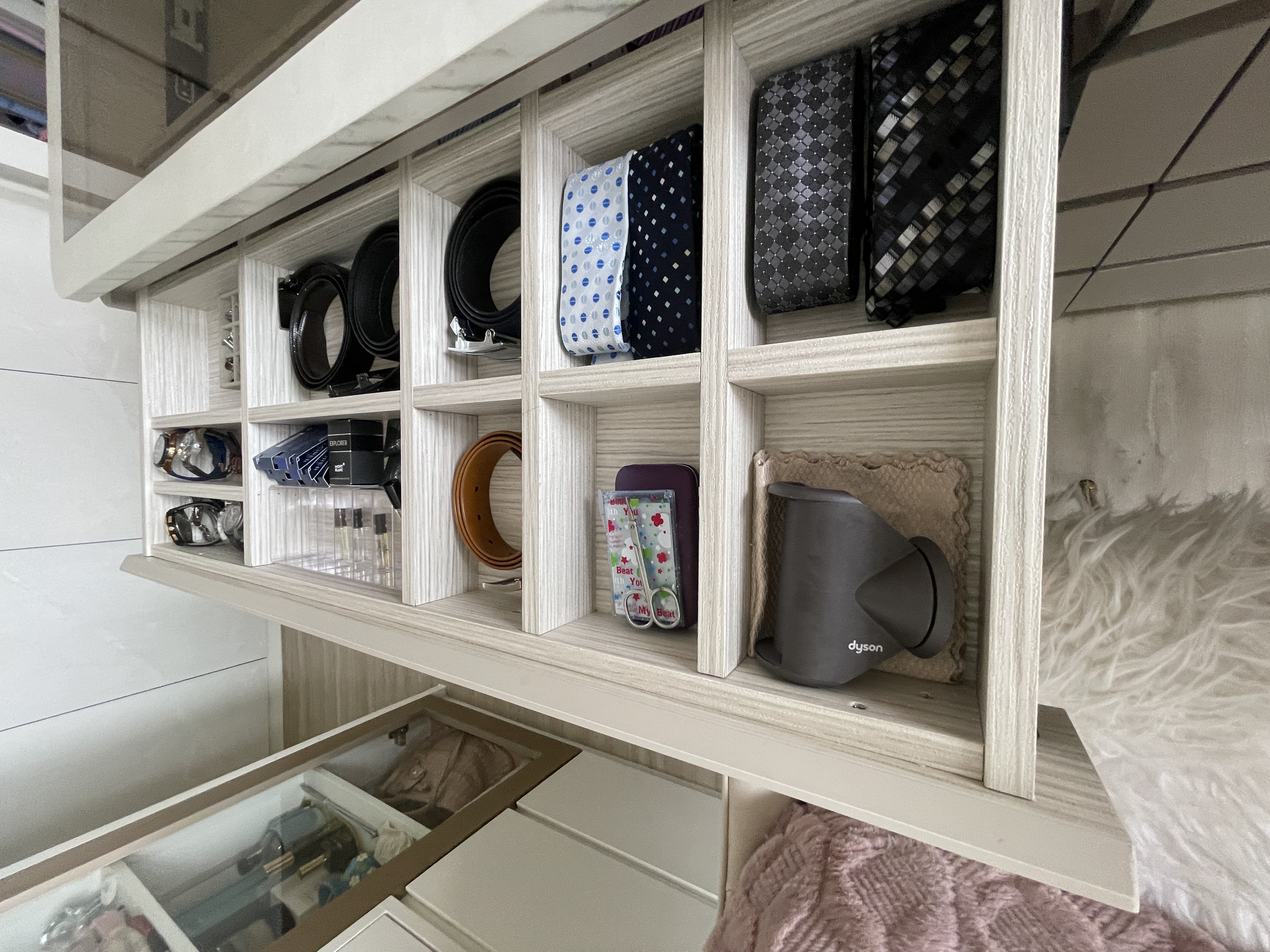 Modern luxe centrepiece curved vanity island in re-invented MBR