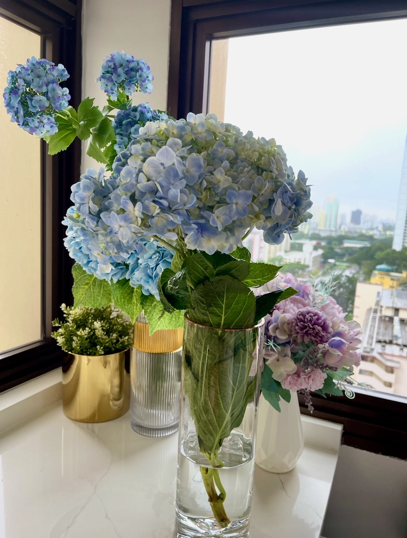 Welcome to our dreamy blue hydrangea-inspired kitchen with city view