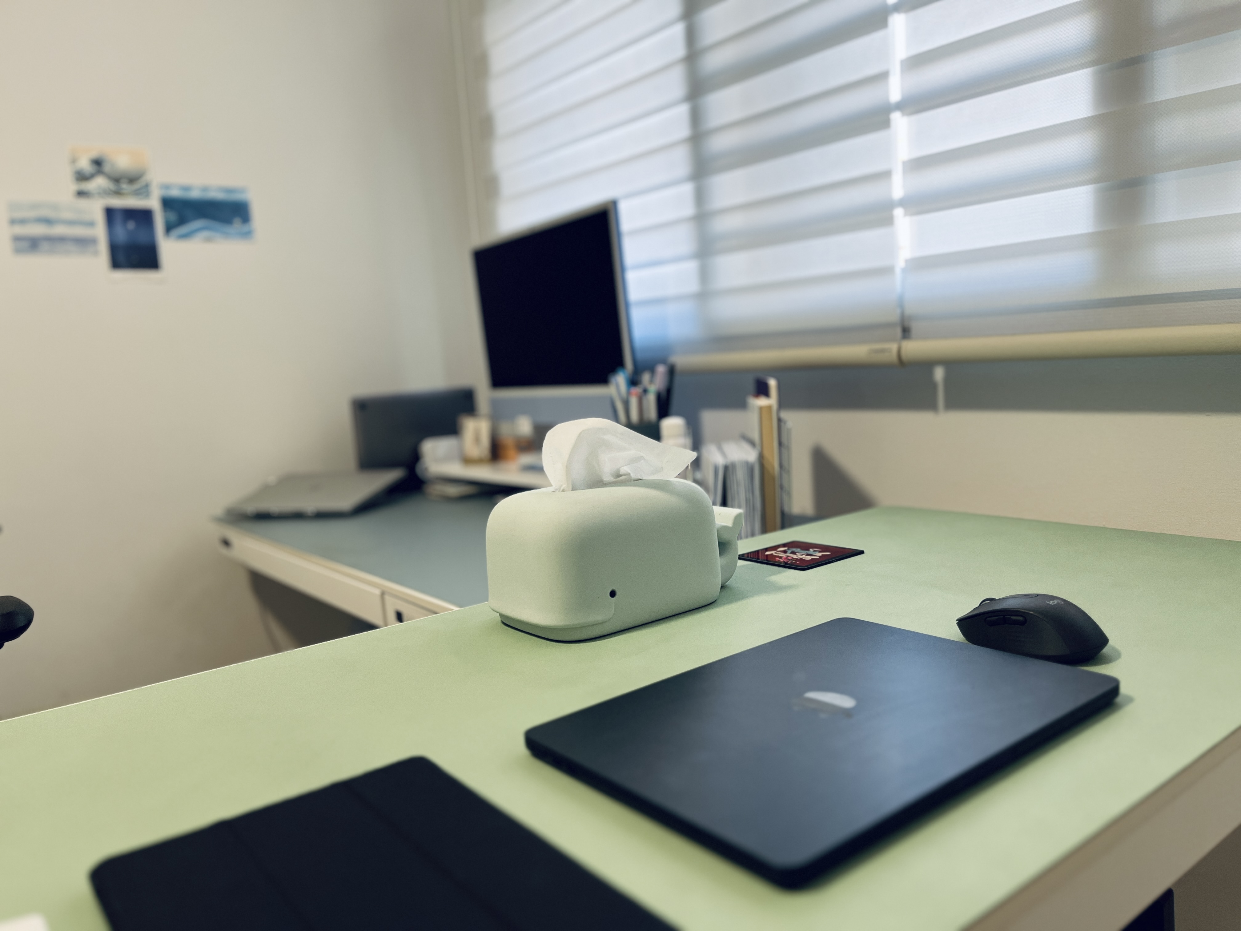 An anime-lover's study/home office with no built-ins