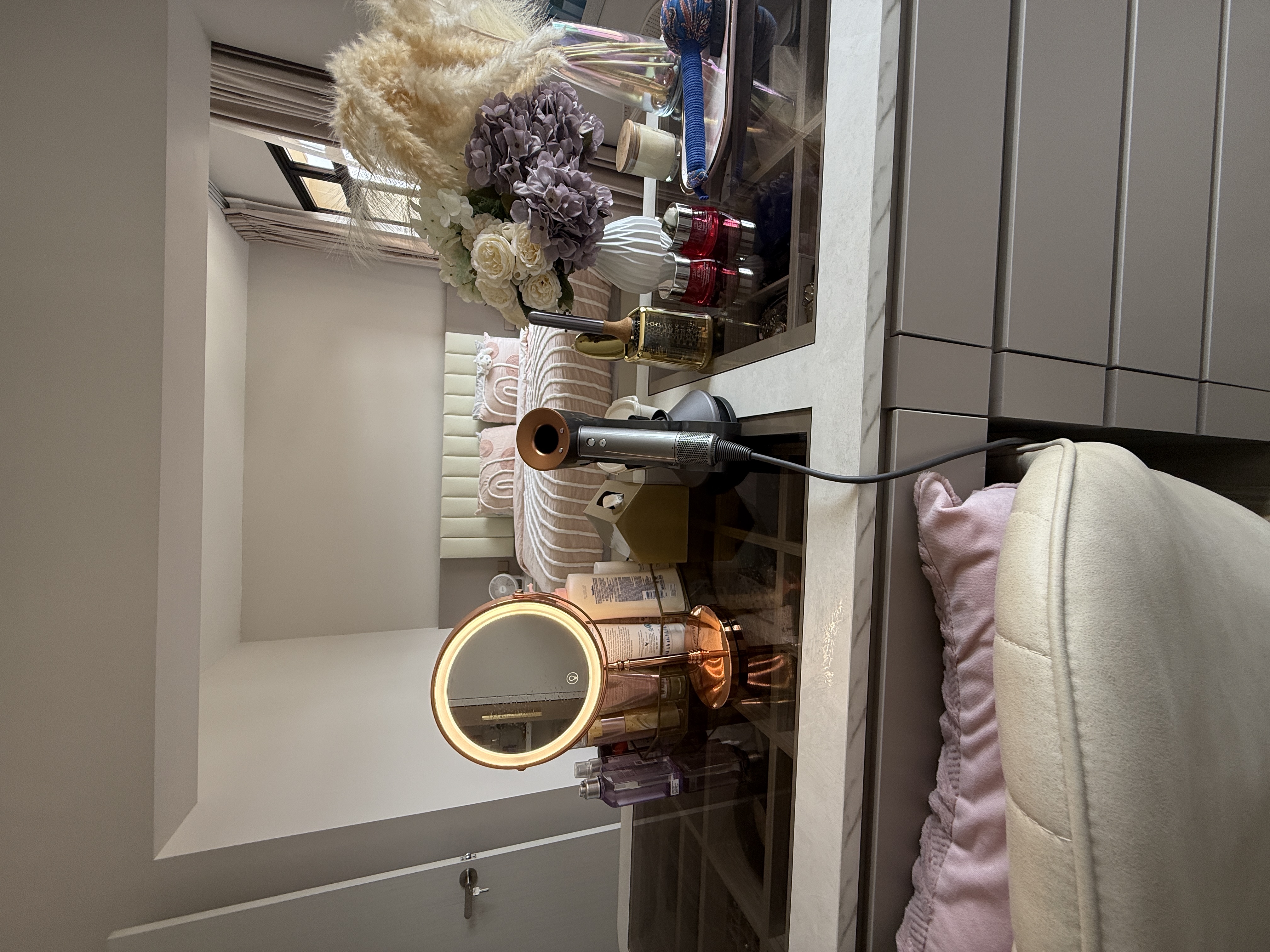 Luxury MBR with vanity island and curves in bronze