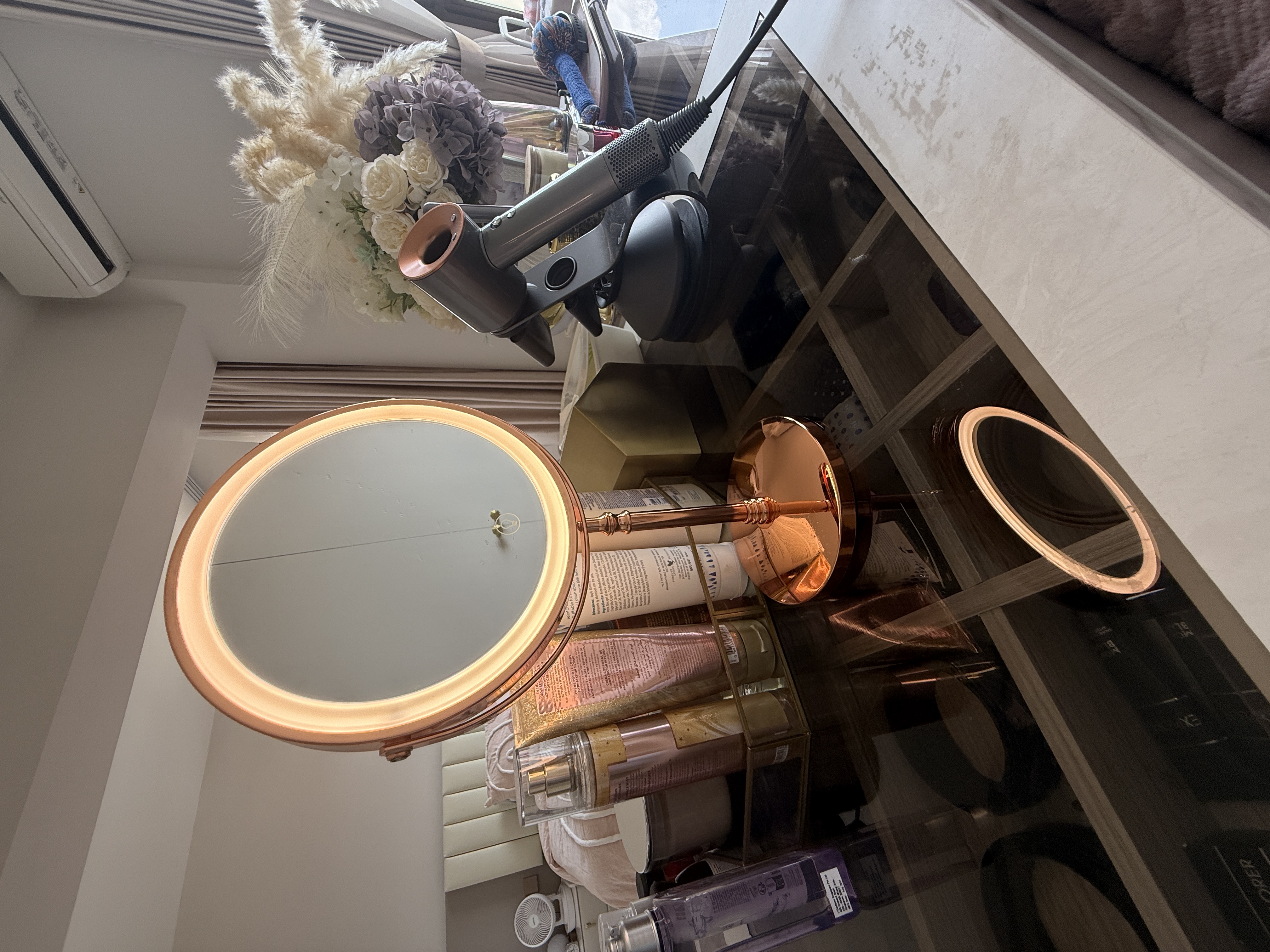 Luxury MBR with vanity island and curves in bronze