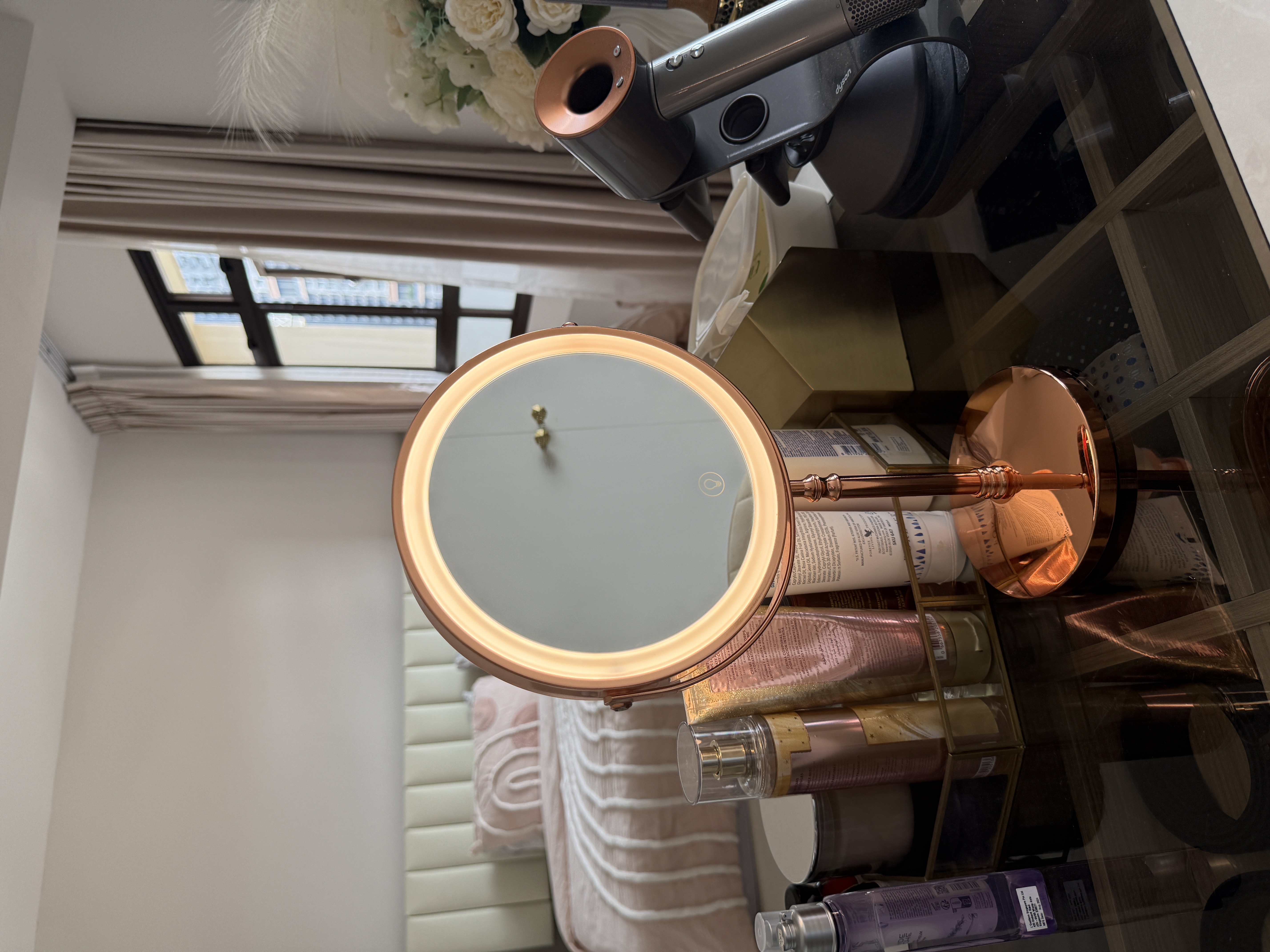 Luxury MBR with vanity island and curves in bronze