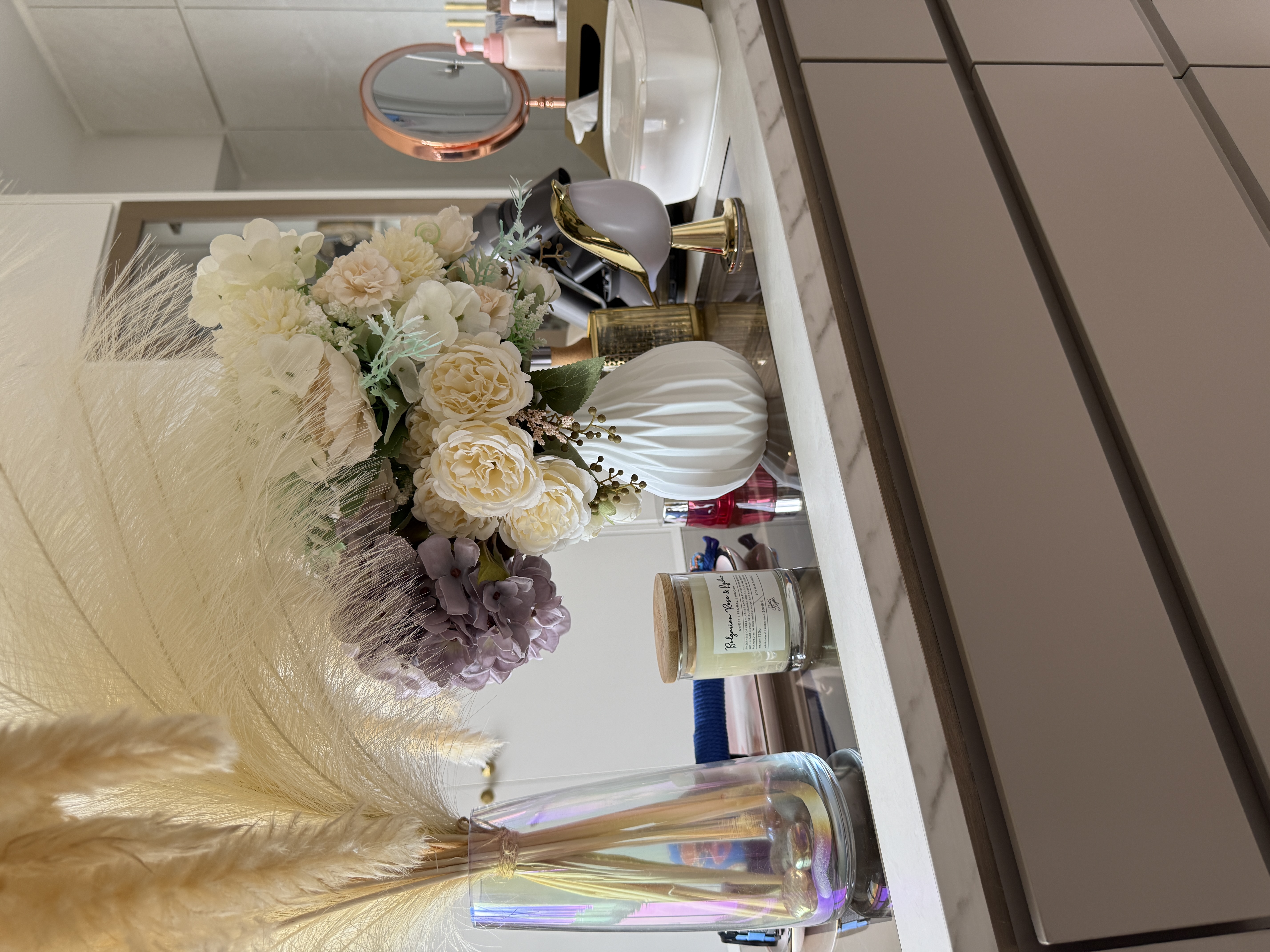 Luxury MBR with vanity island and curves in bronze