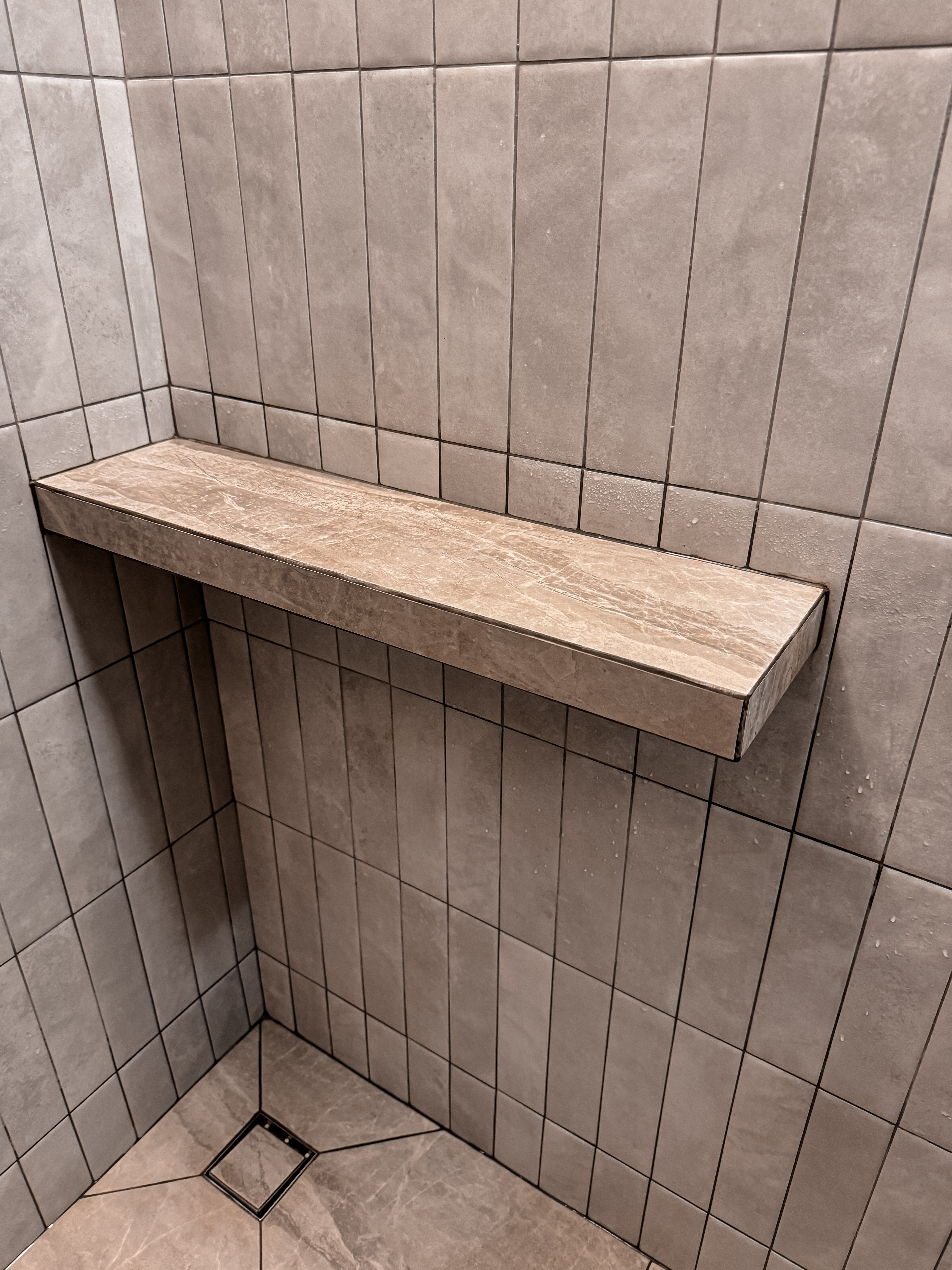 Stone, Wood & Gunmetal: A Peek Into Our Common Toilet