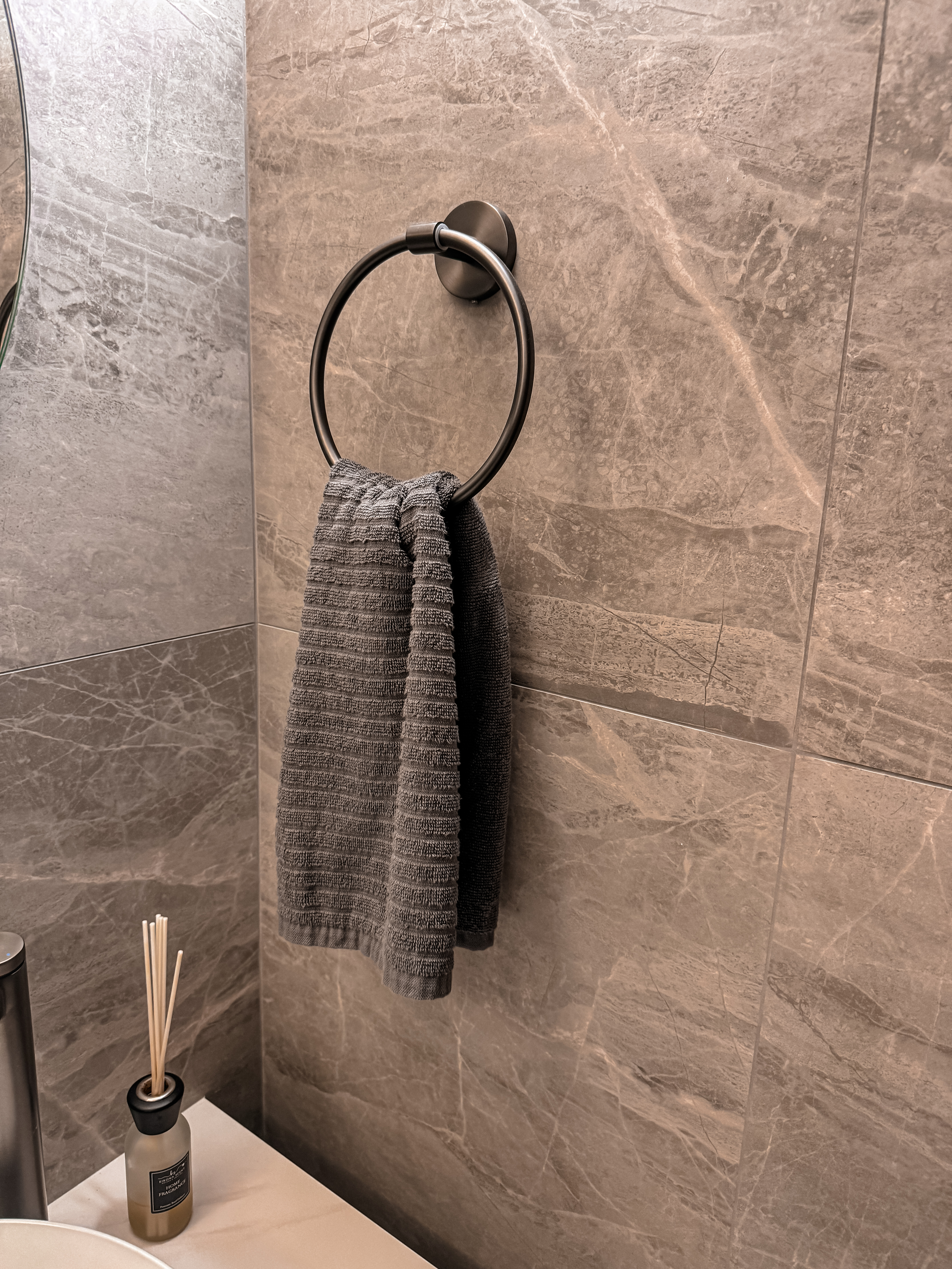 Stone, Wood & Gunmetal: A Peek Into Our Common Toilet