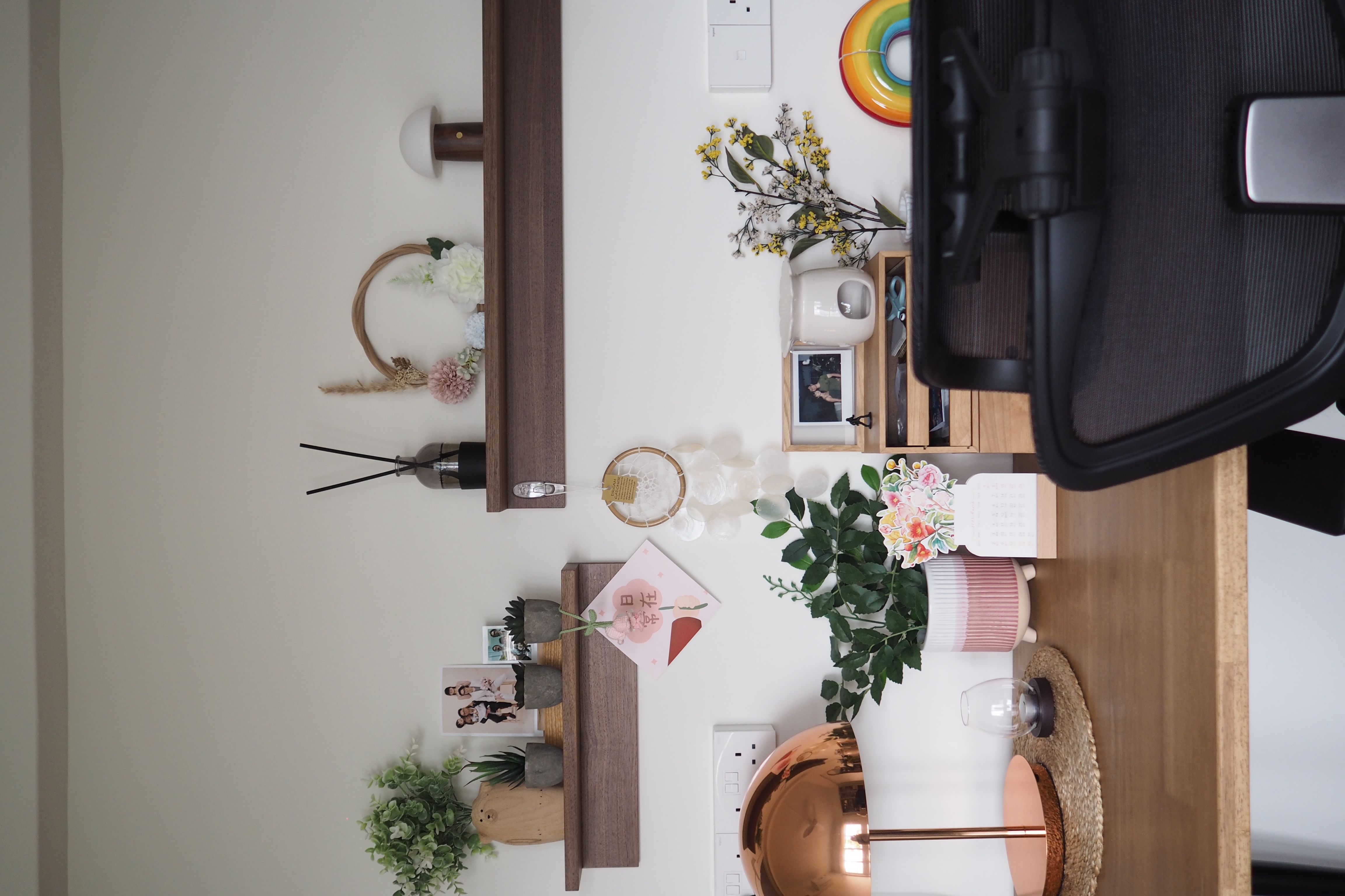 Home workspace with lots of knick knacks 🪴