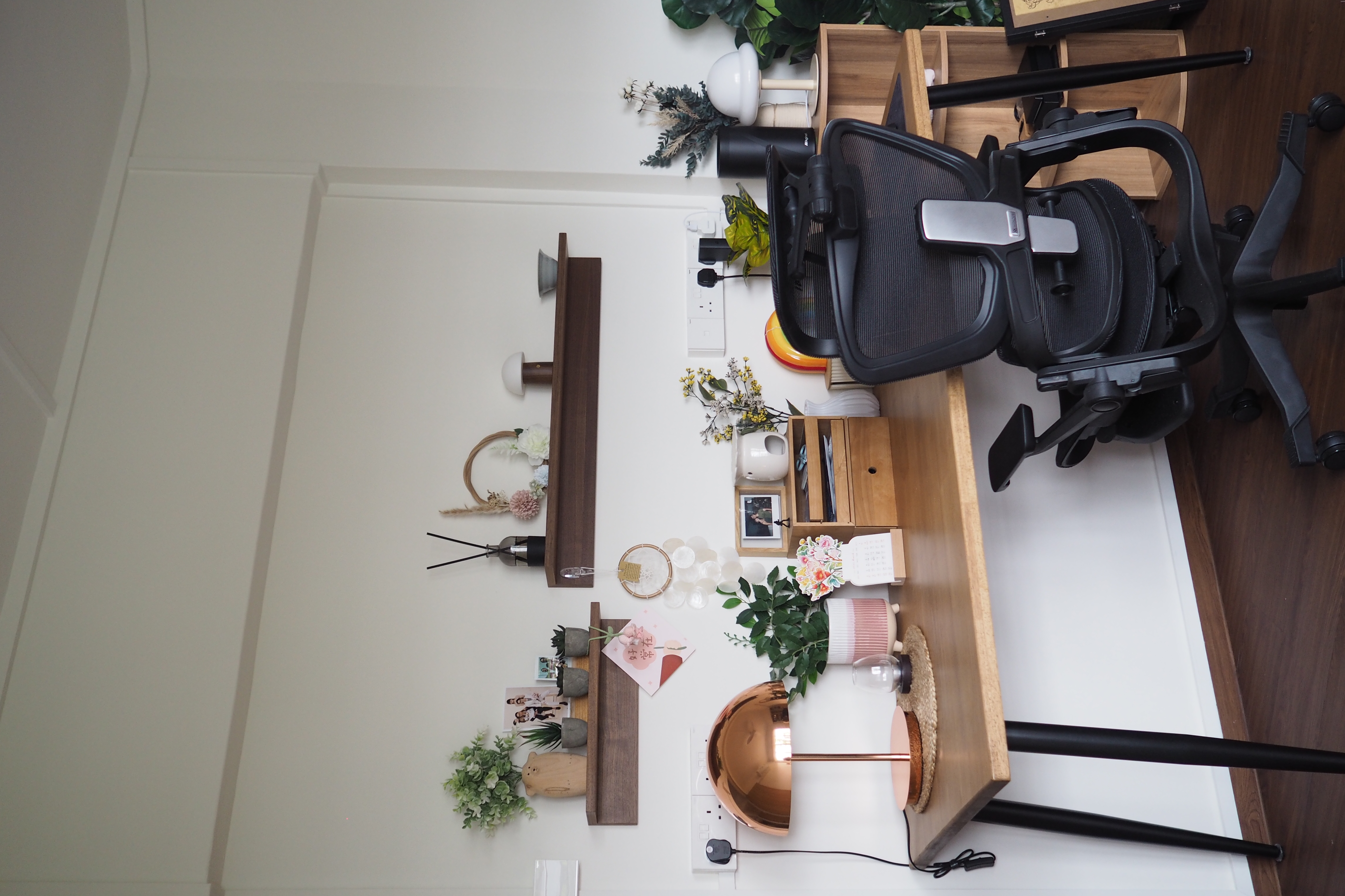 Home workspace with lots of knick knacks 🪴