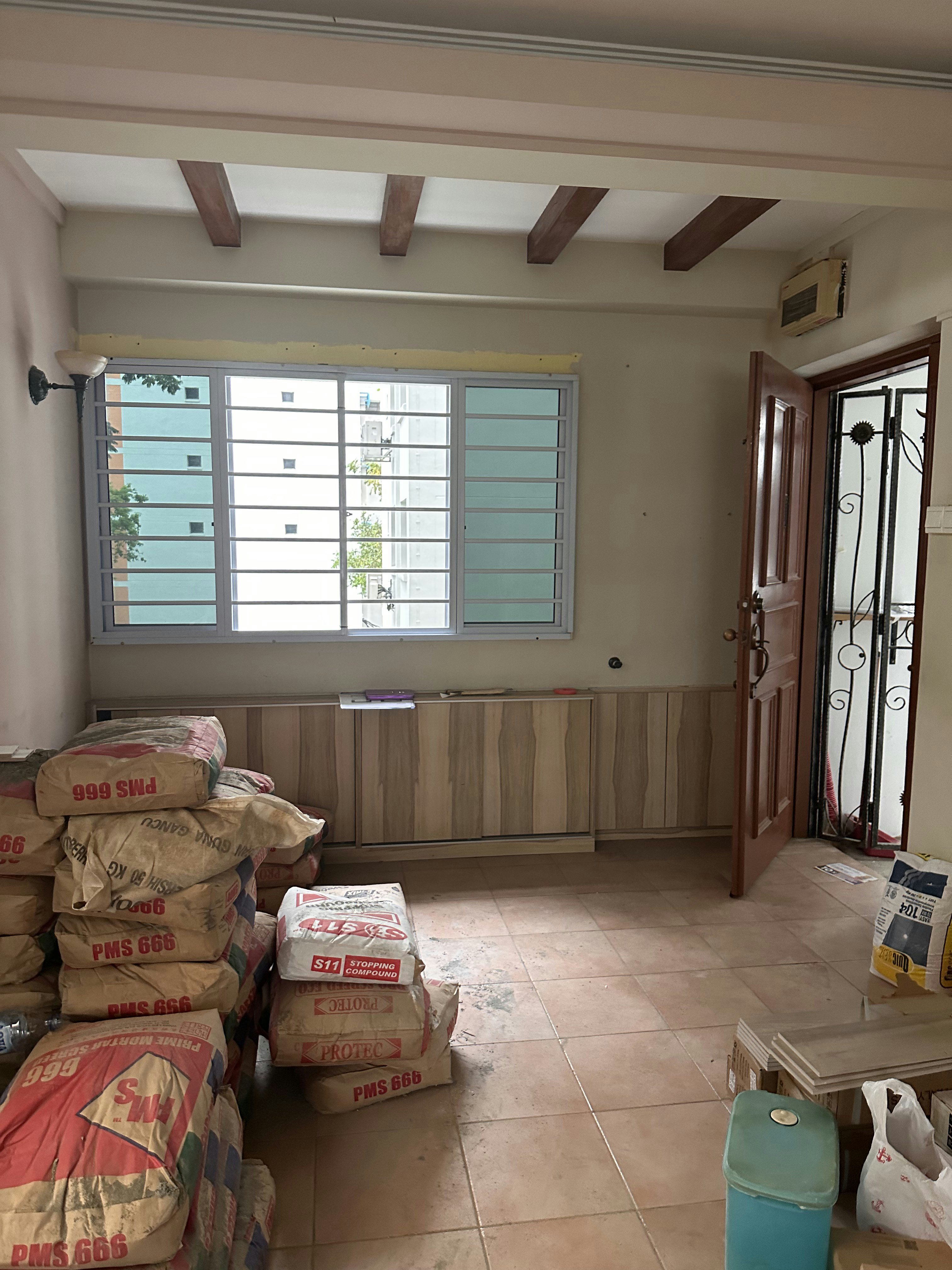 Before After of our DIY stone wall-farmhose on a budjet