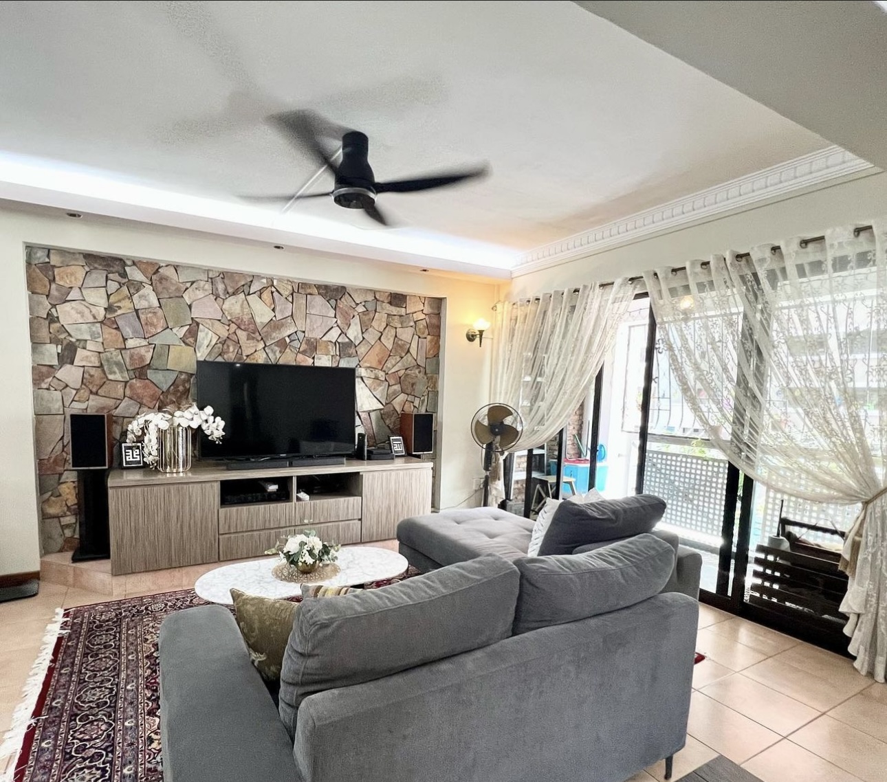 Before After of our DIY stone wall-farmhose on a budjet