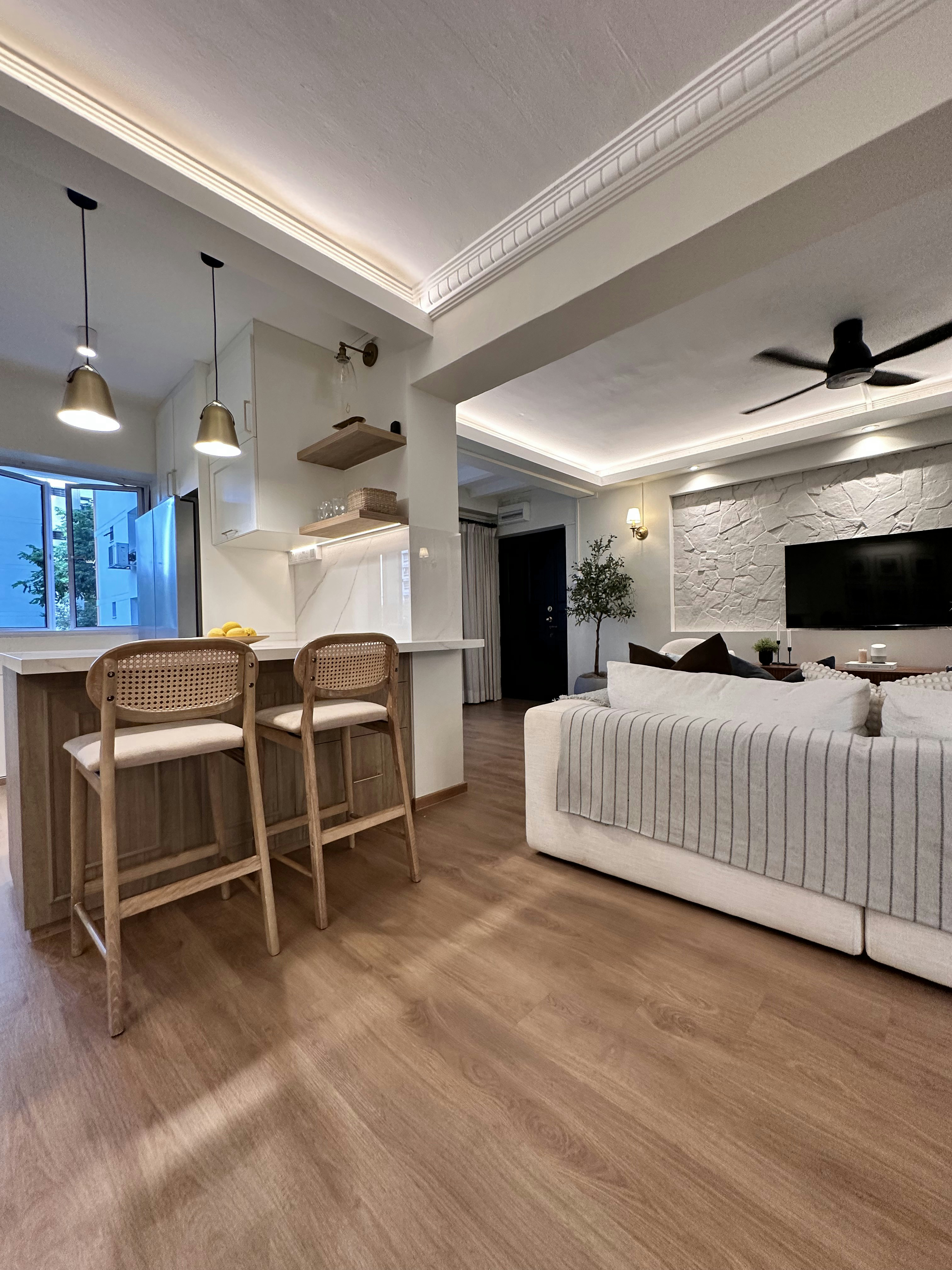 Before After of our DIY stone wall-farmhose on a budjet