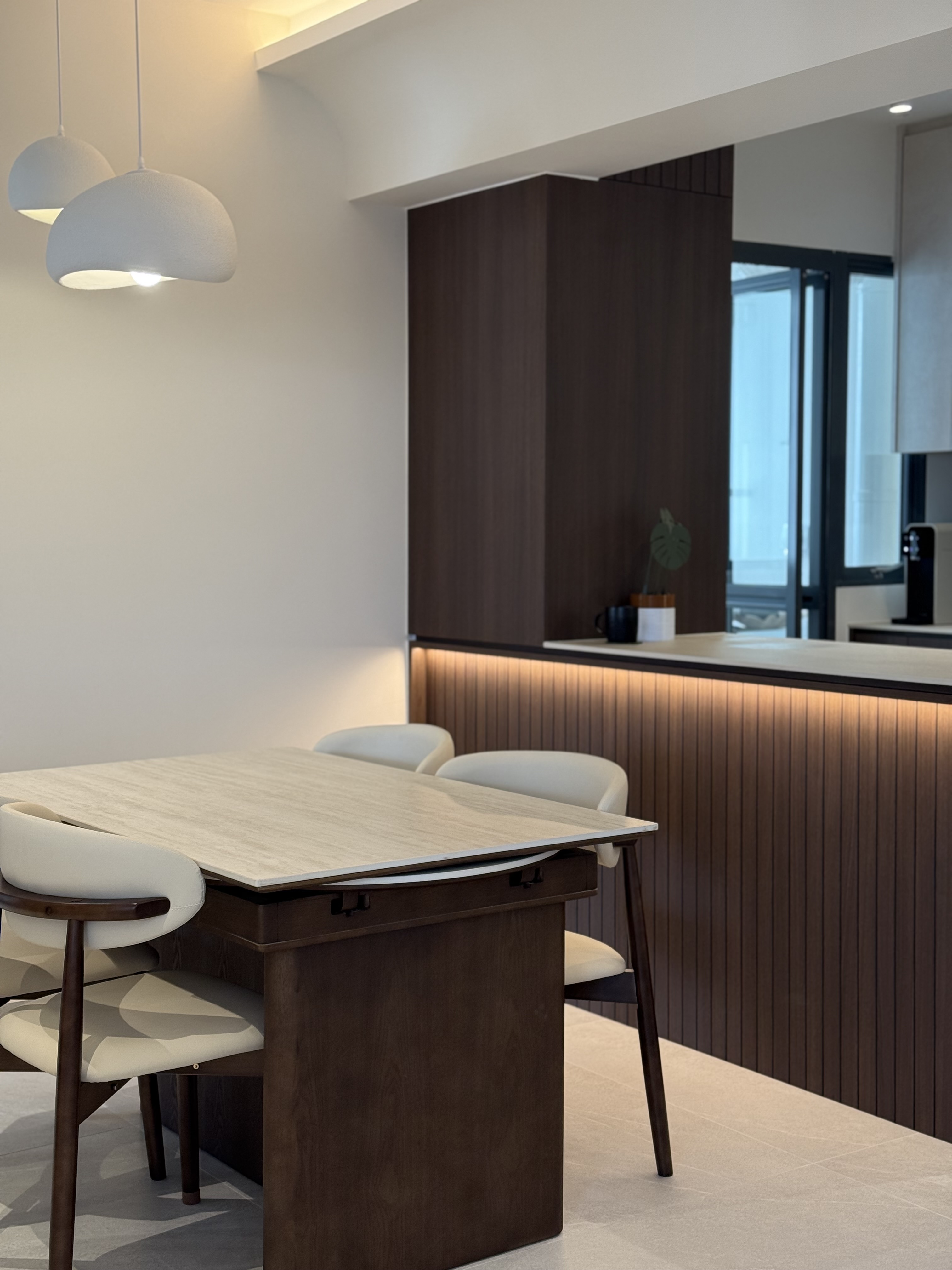 No walls, no distance — just a kitchen island at the center of it all