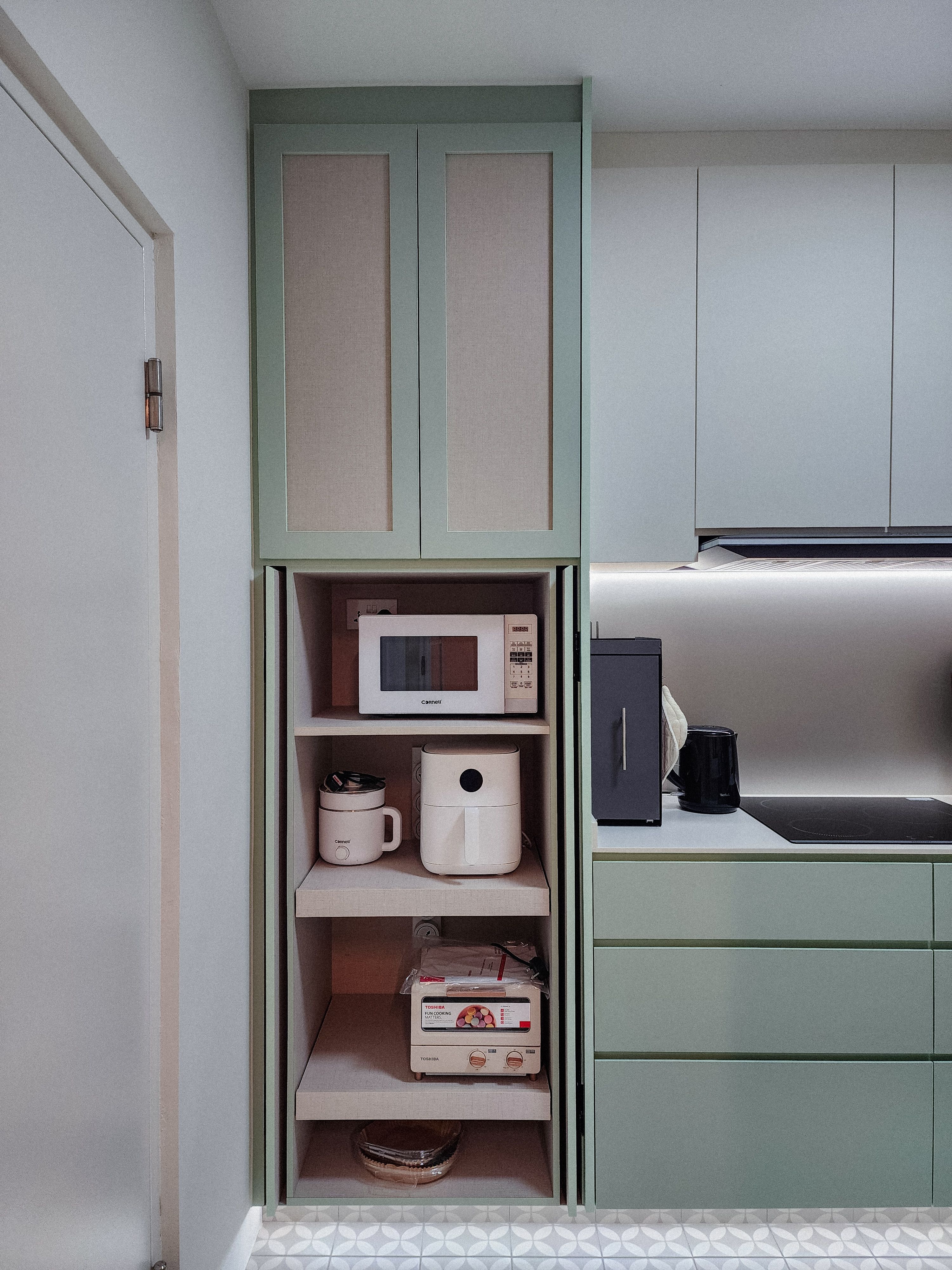 Peranakan inspired kitchen with hidden storage and a power track hack!
