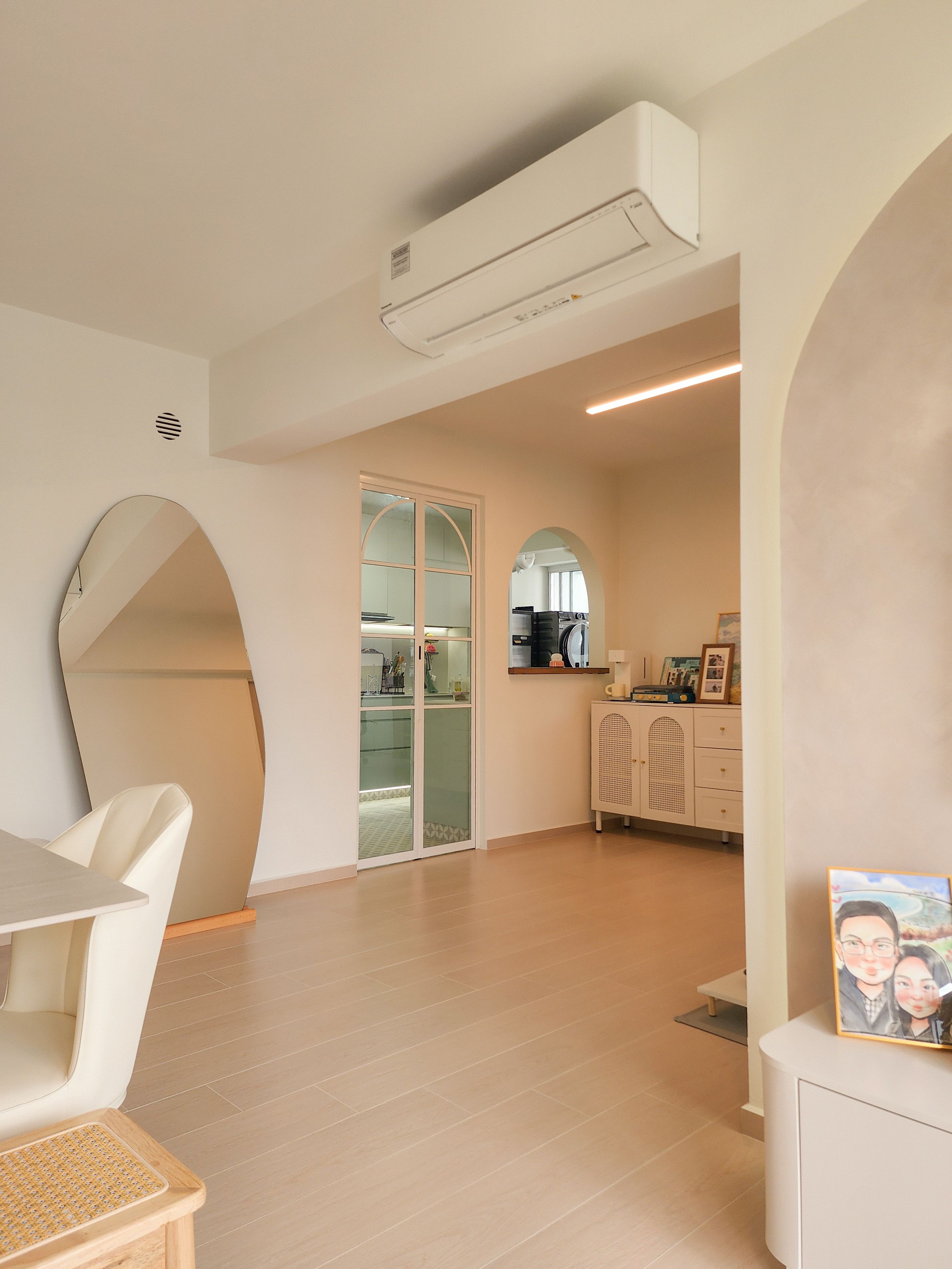 Home tour: $60k 4rm reno for a creamy home with arches and curves