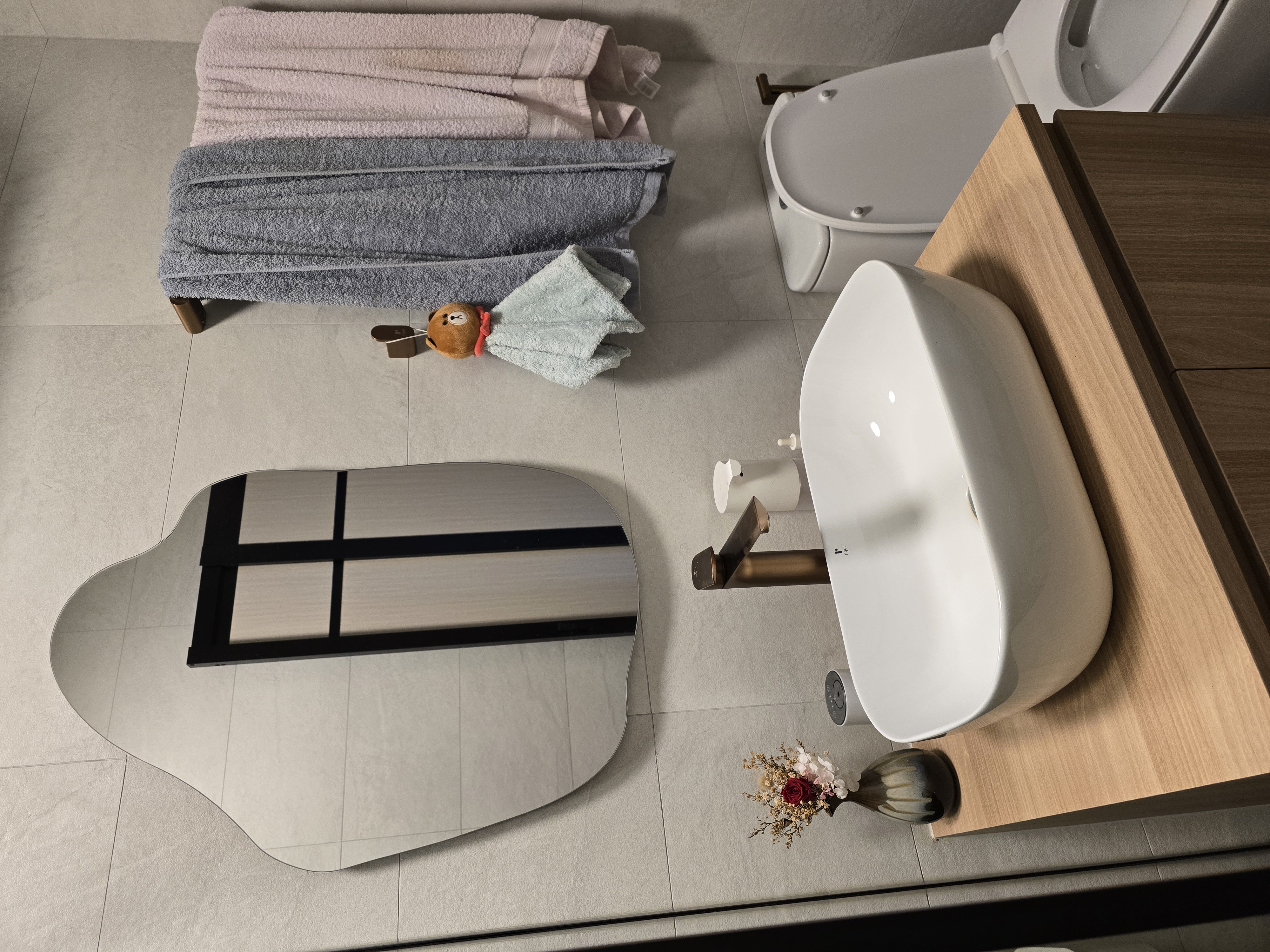 Common Bathroom with brushed copper fittings