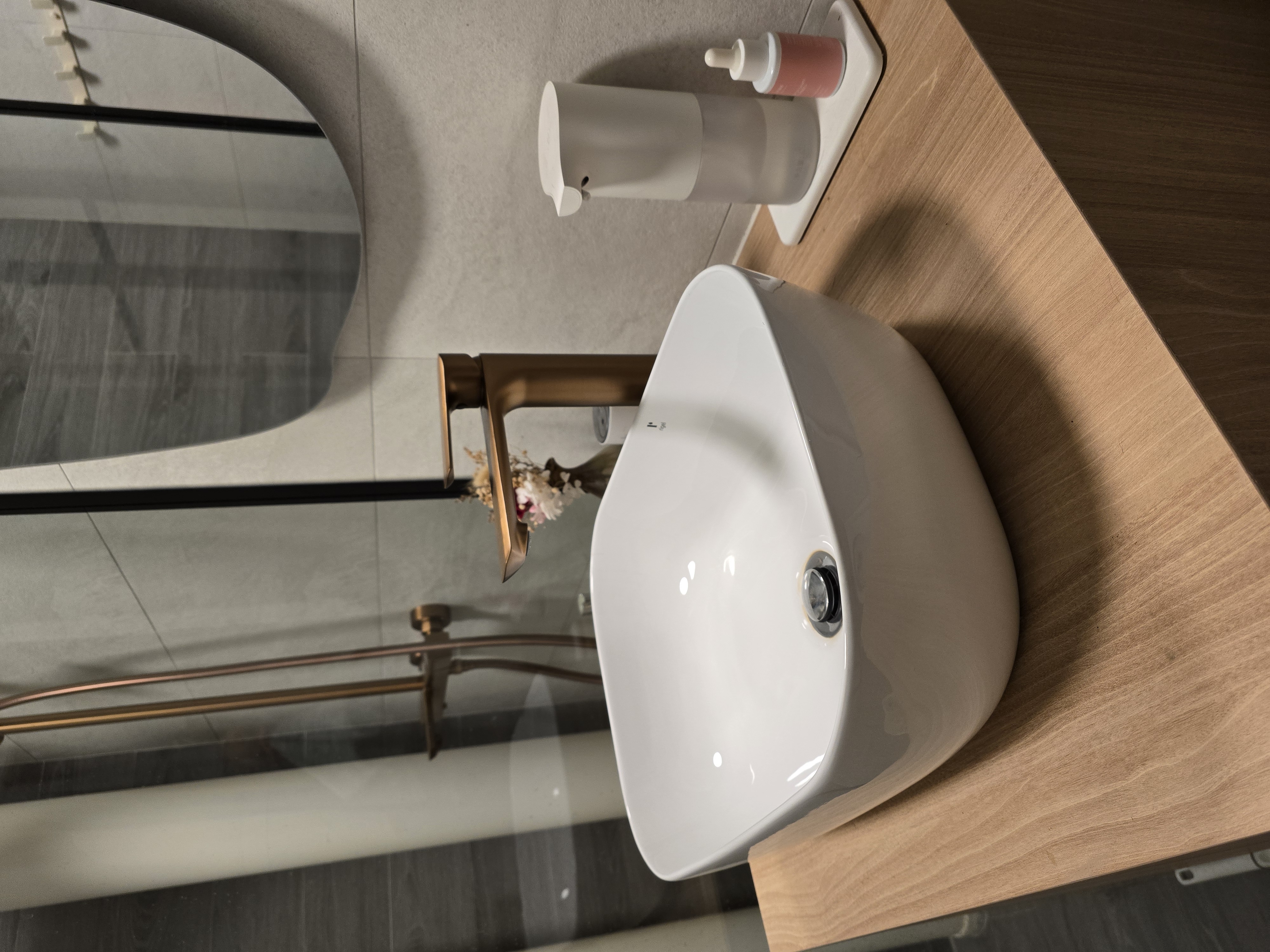 Common Bathroom with brushed copper fittings