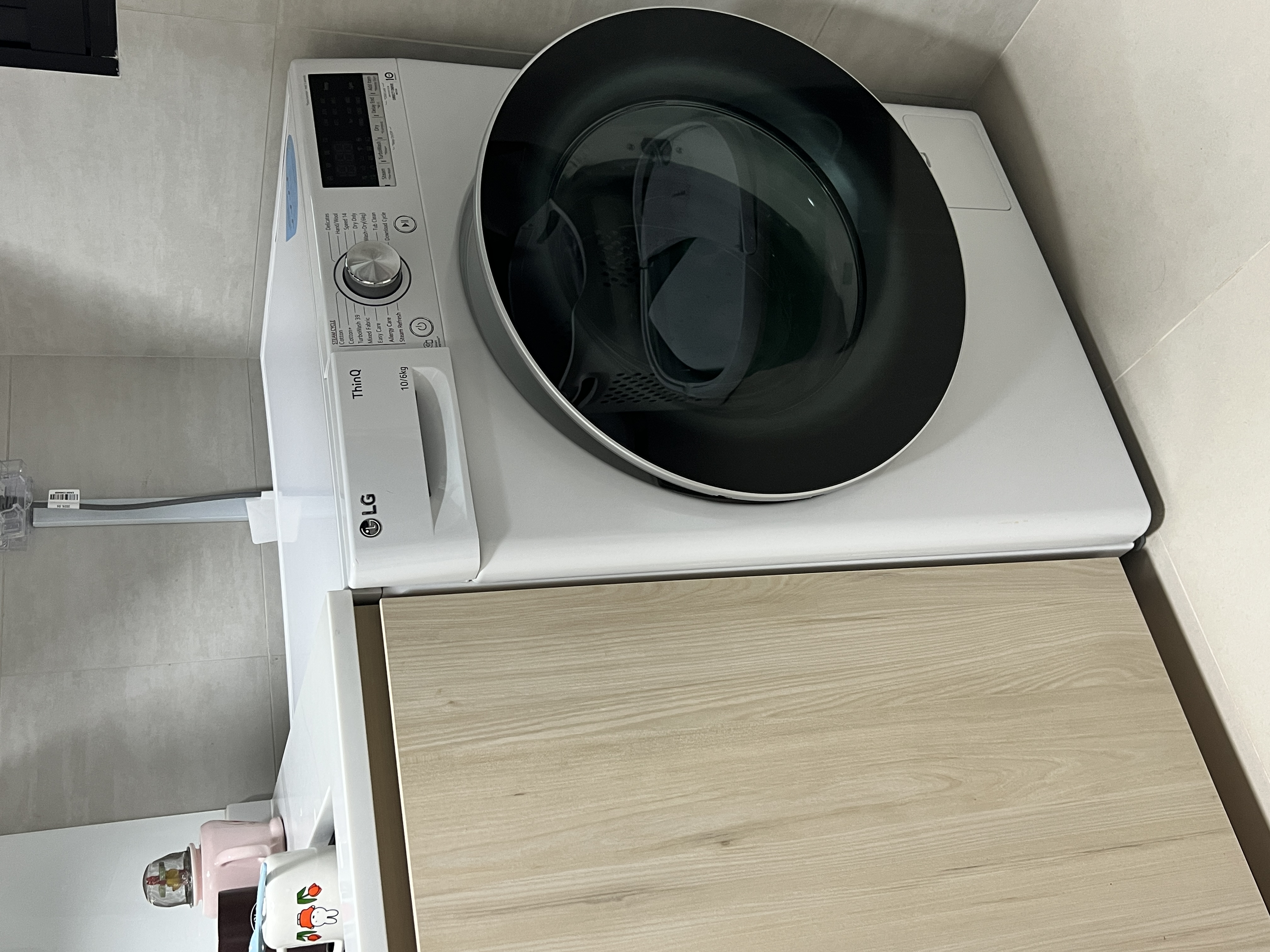 Our cozy little space - featuring our kitchen sink, hod and hood