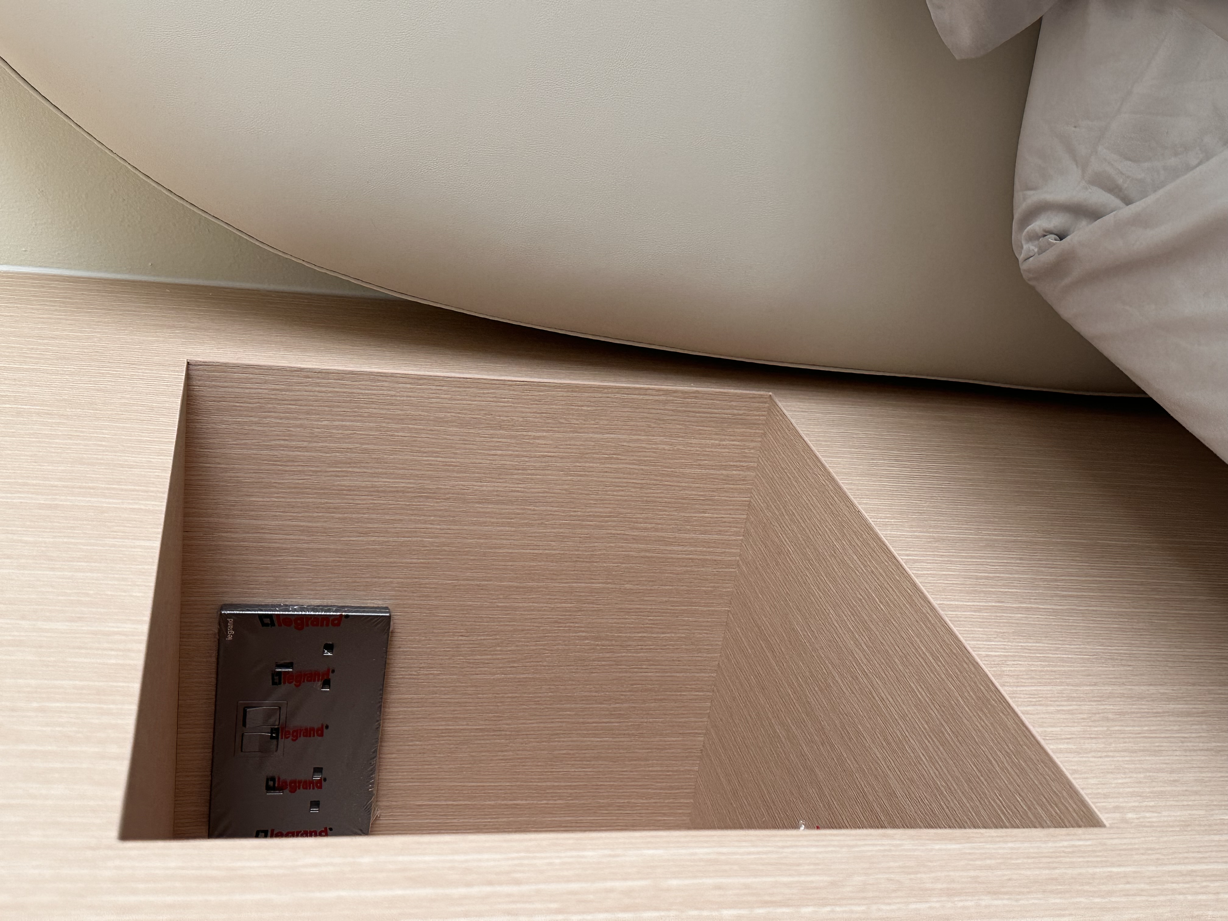 Hidden vanity and bedside niche