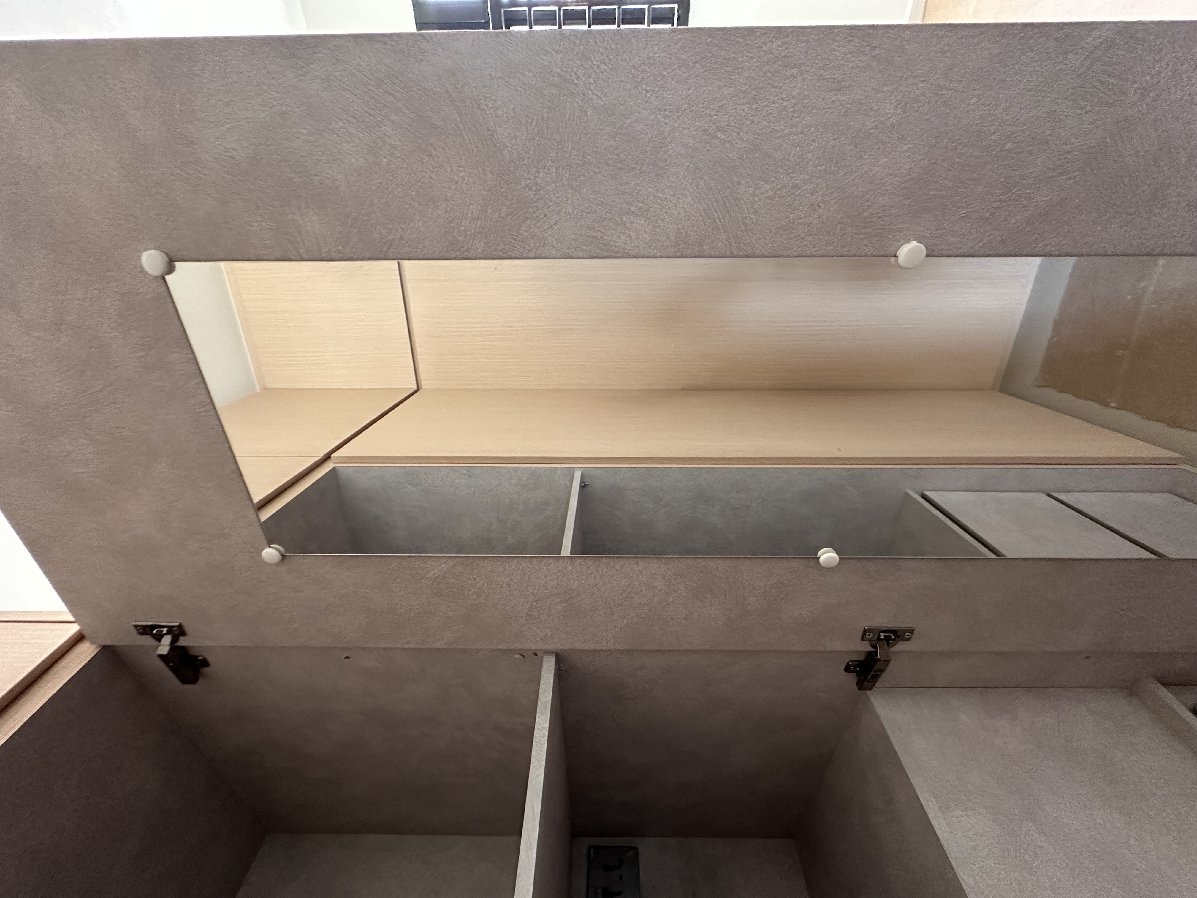 Hidden vanity and bedside niche