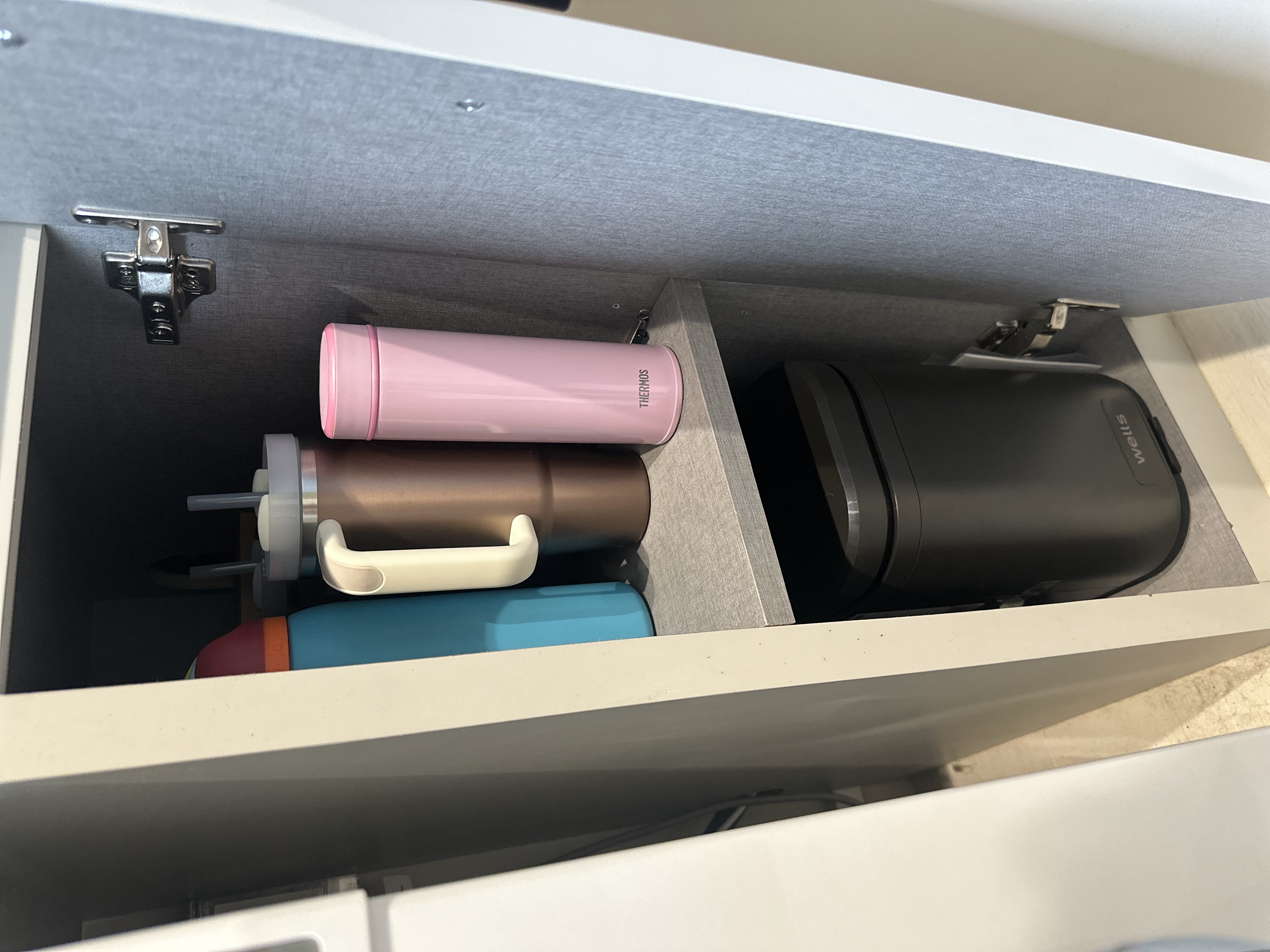 My Dual-Purpose Laundry Nook with a Built-In Water Dispenser