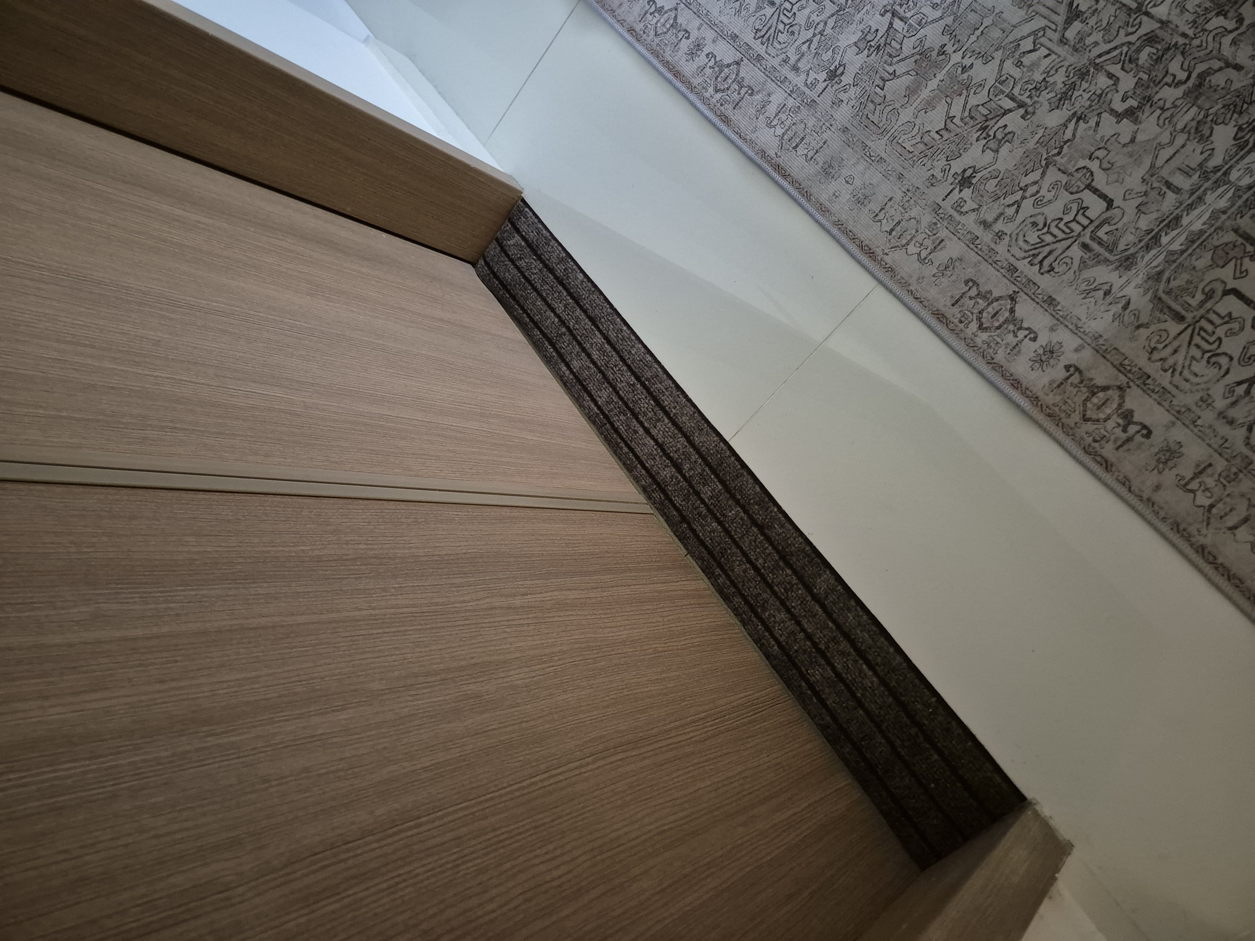 We removed the typical bathmat & replaced it with something minimal!