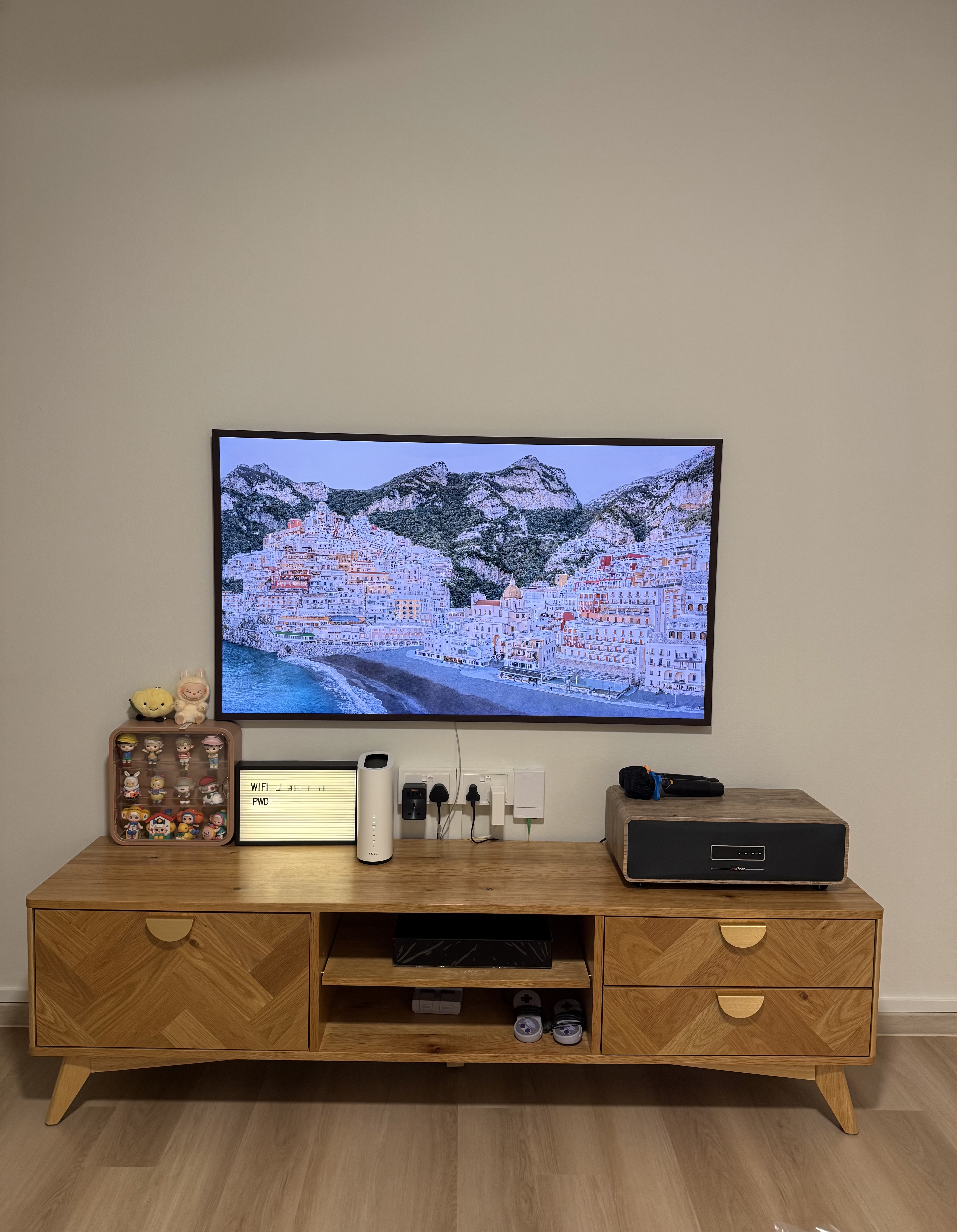 This living room blends minimalist design with warm, natural touches.