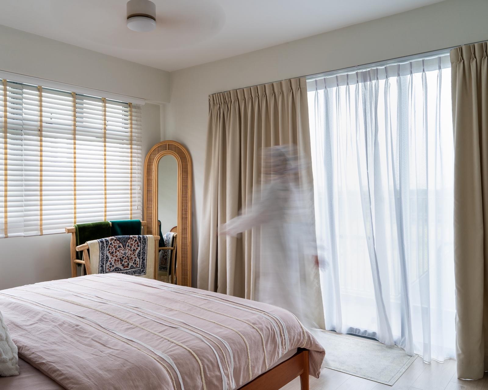 A-Serene-Master-Bedroom--with-a-Balcony-View-🌿