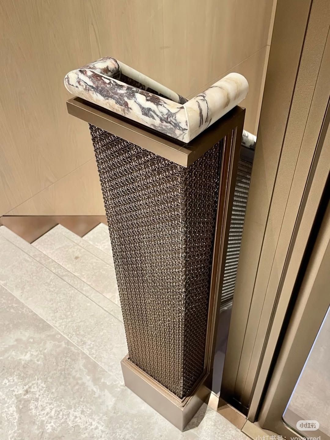 Luxe staircase design details with metal grille