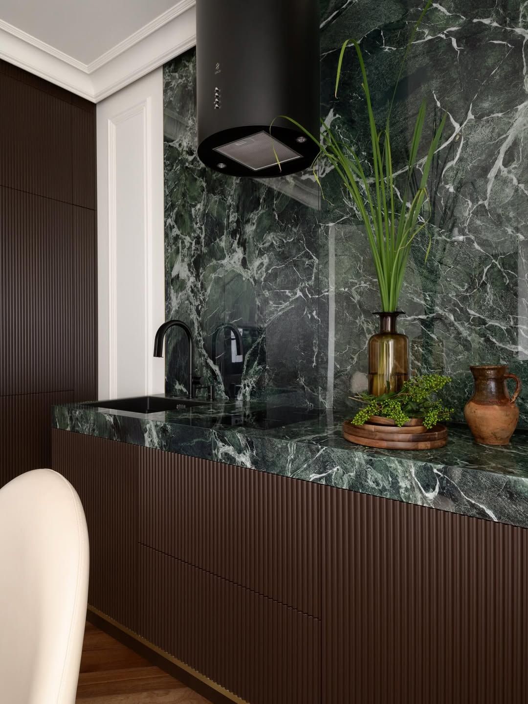 Luxe dining room with marble niche