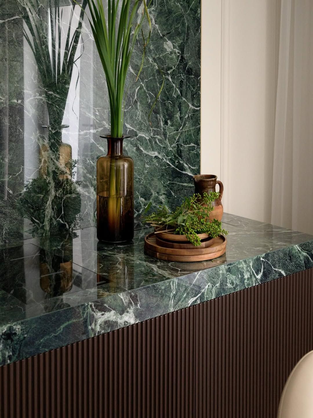 Luxe dining room with marble niche