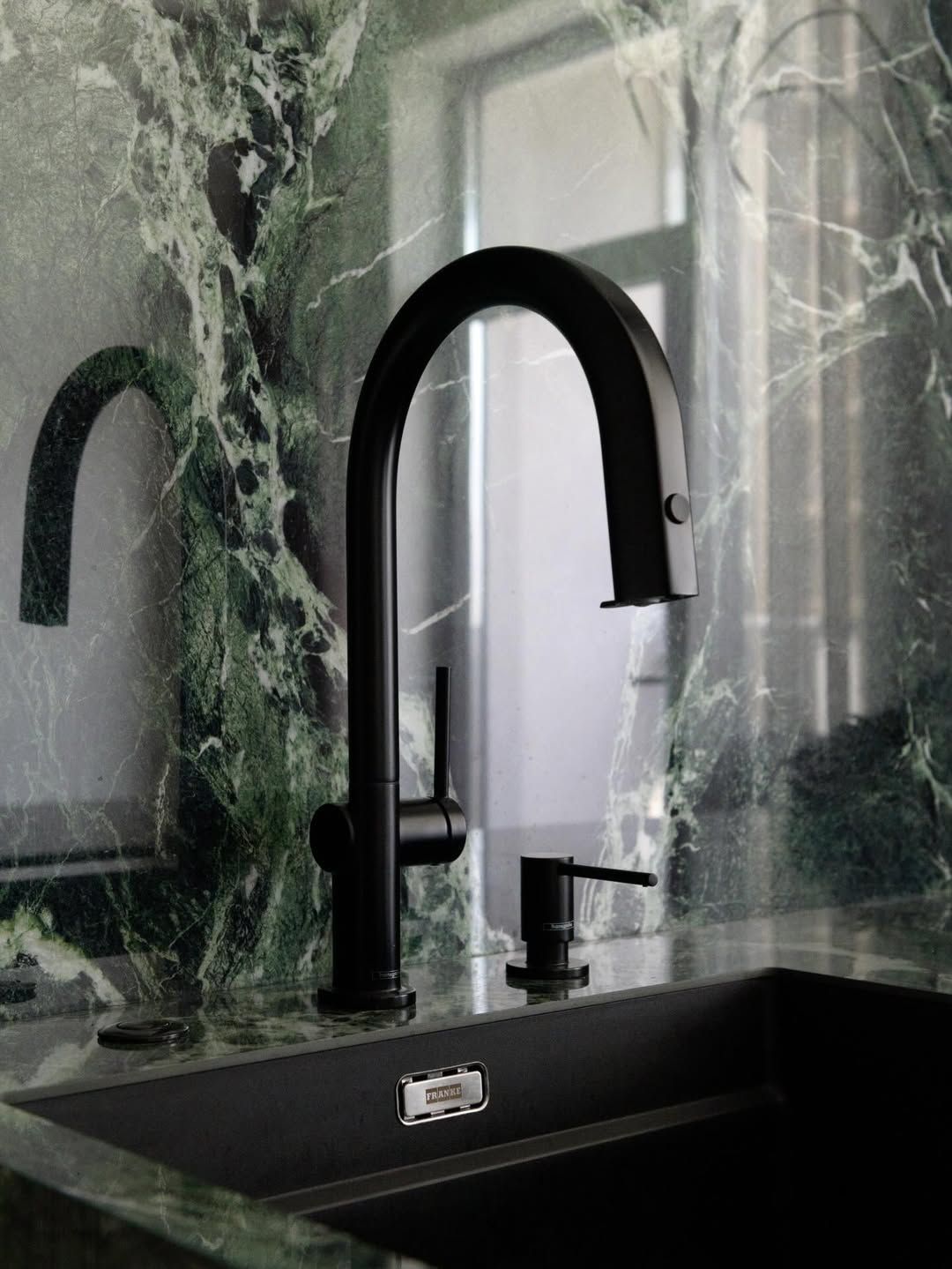 Luxe dining room with marble niche