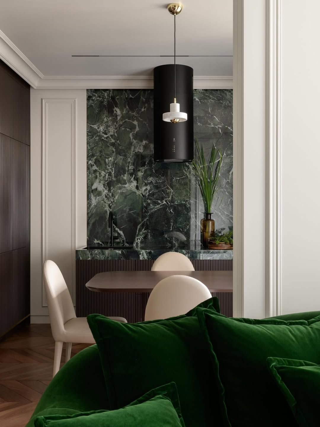 Luxe dining room with marble niche