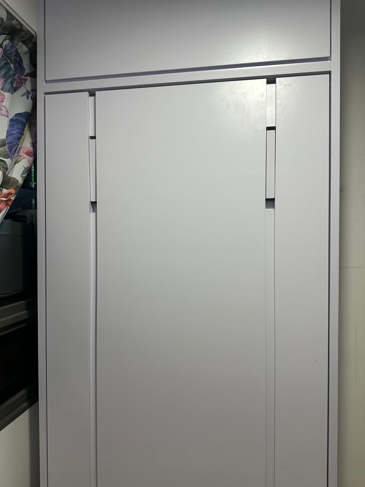 Custom Ceiling-Height Cabinet with Integrated Murphy Bed