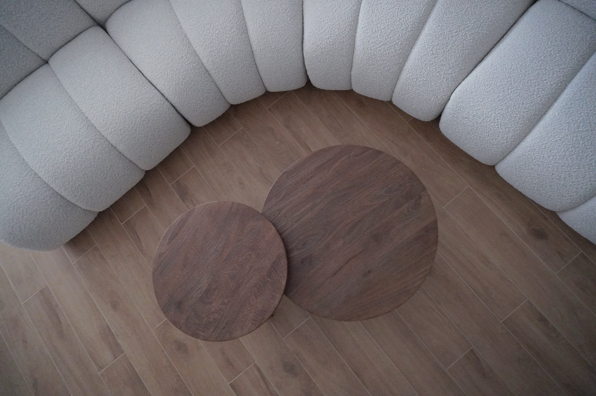 Quiet Curves Over Bold Arches