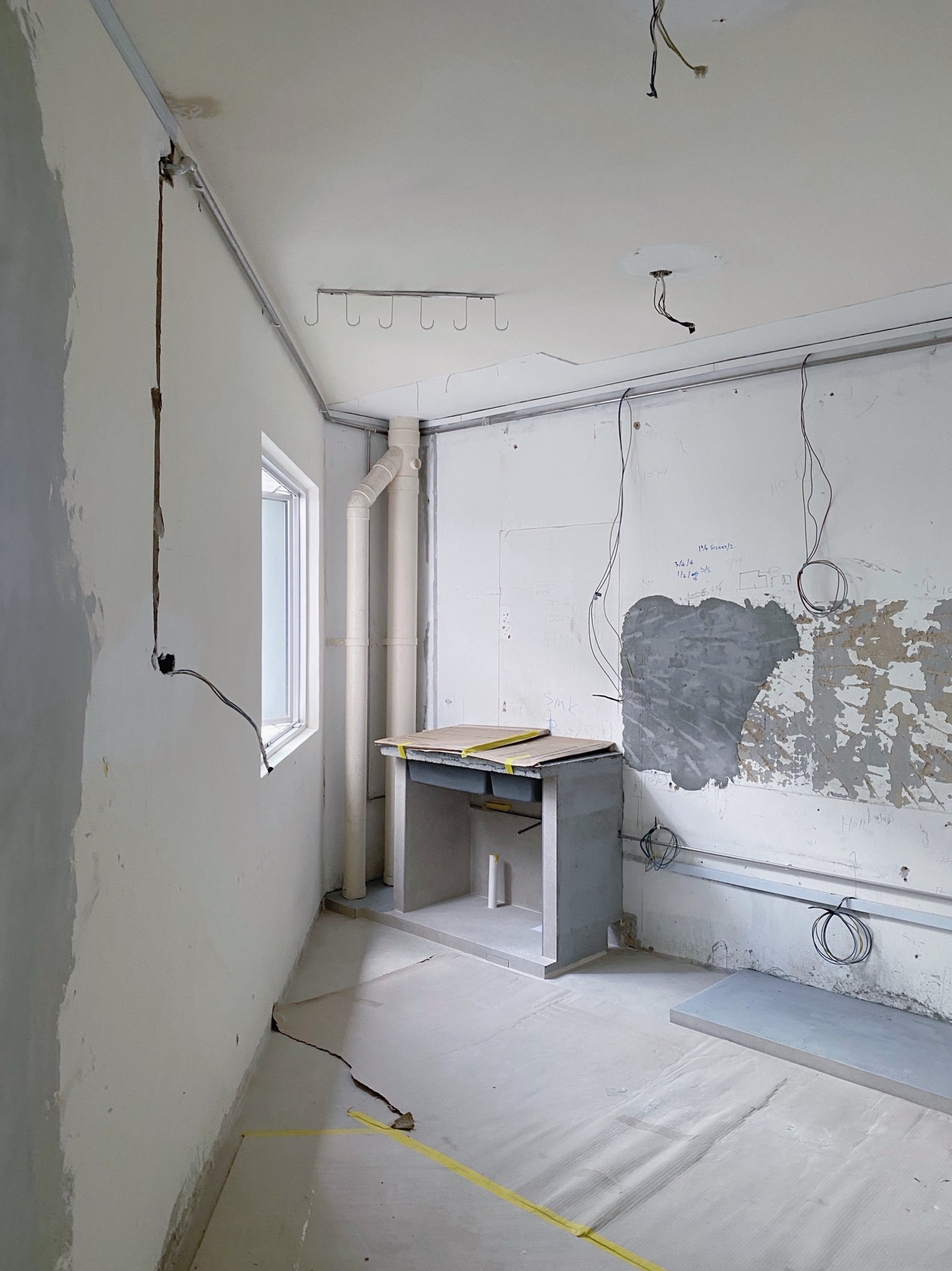 Kitchen Cabinetry: Shaker Panels & Concrete Sink Base