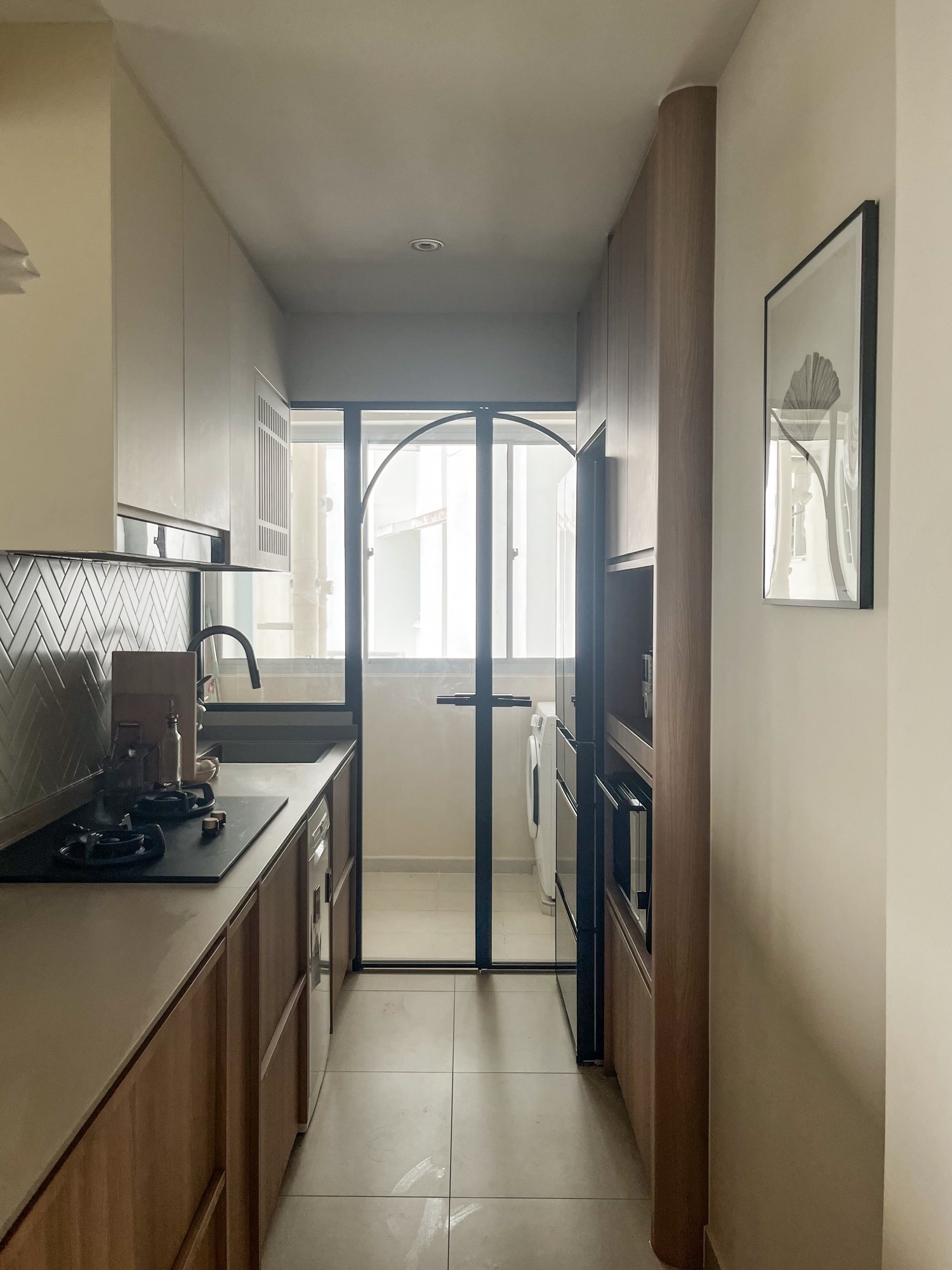The kitchen and service yard: space-saving appliances are gold