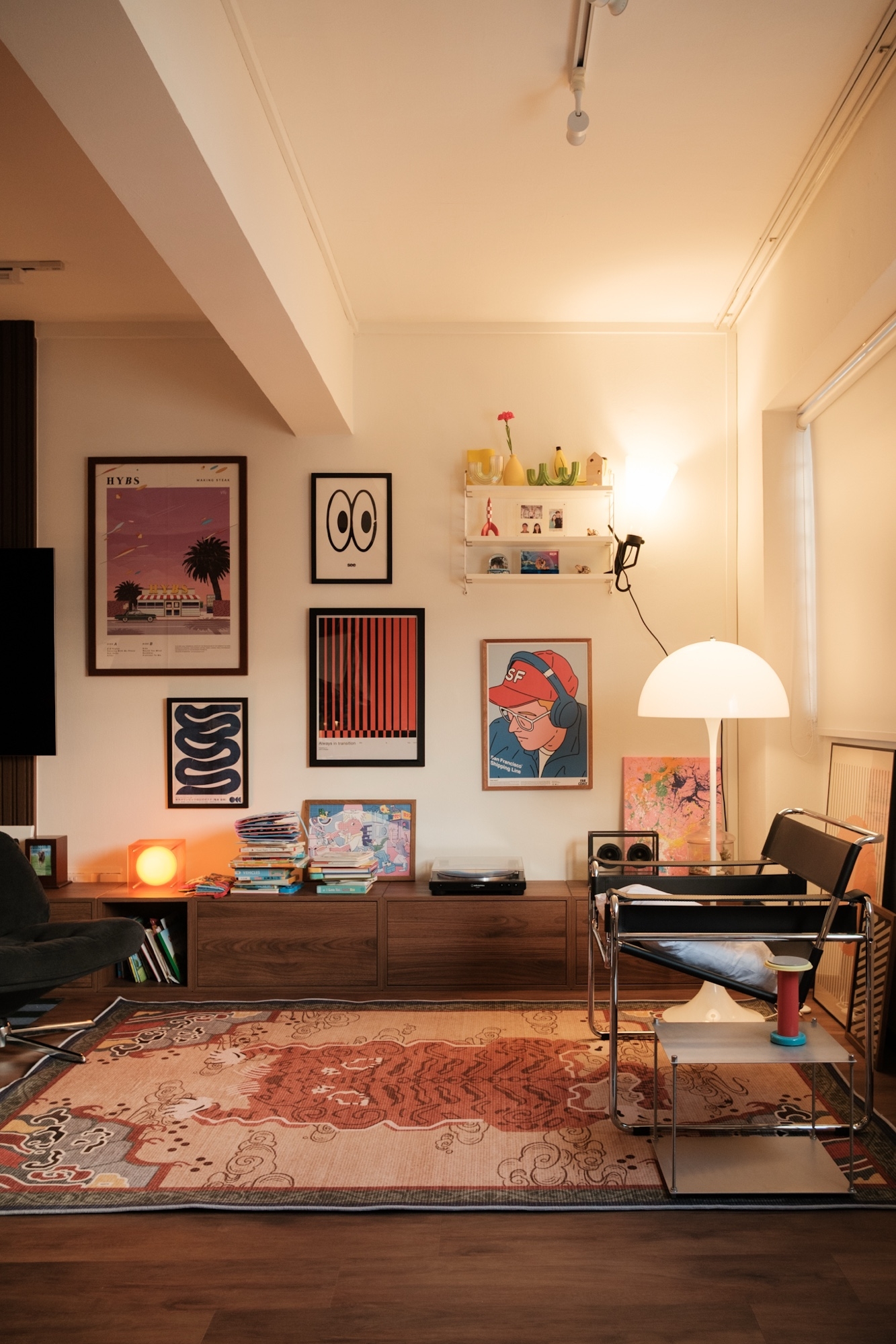 Adding flavour to the space with rugs!