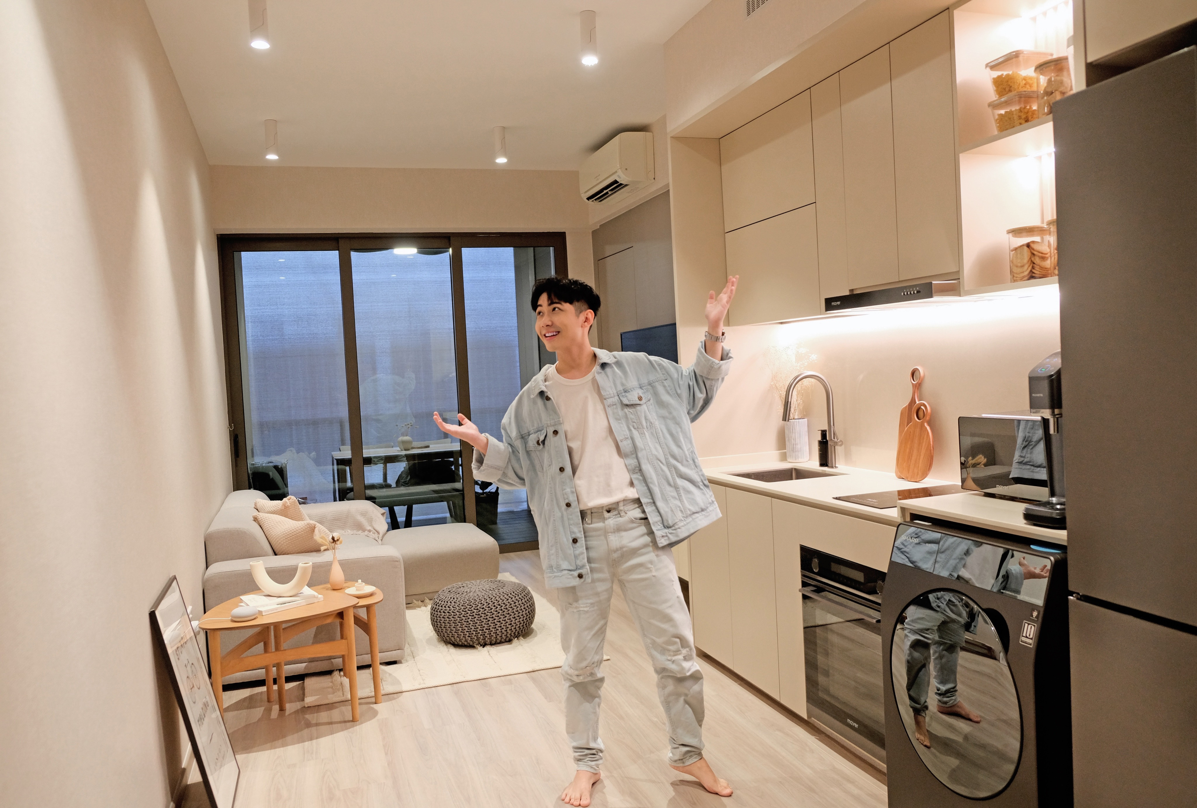 Inside My Scandi-Minimalist 1 Bedder Resale Condominium - Modern kitchen with beige walls, ceiling lights, and a sliding