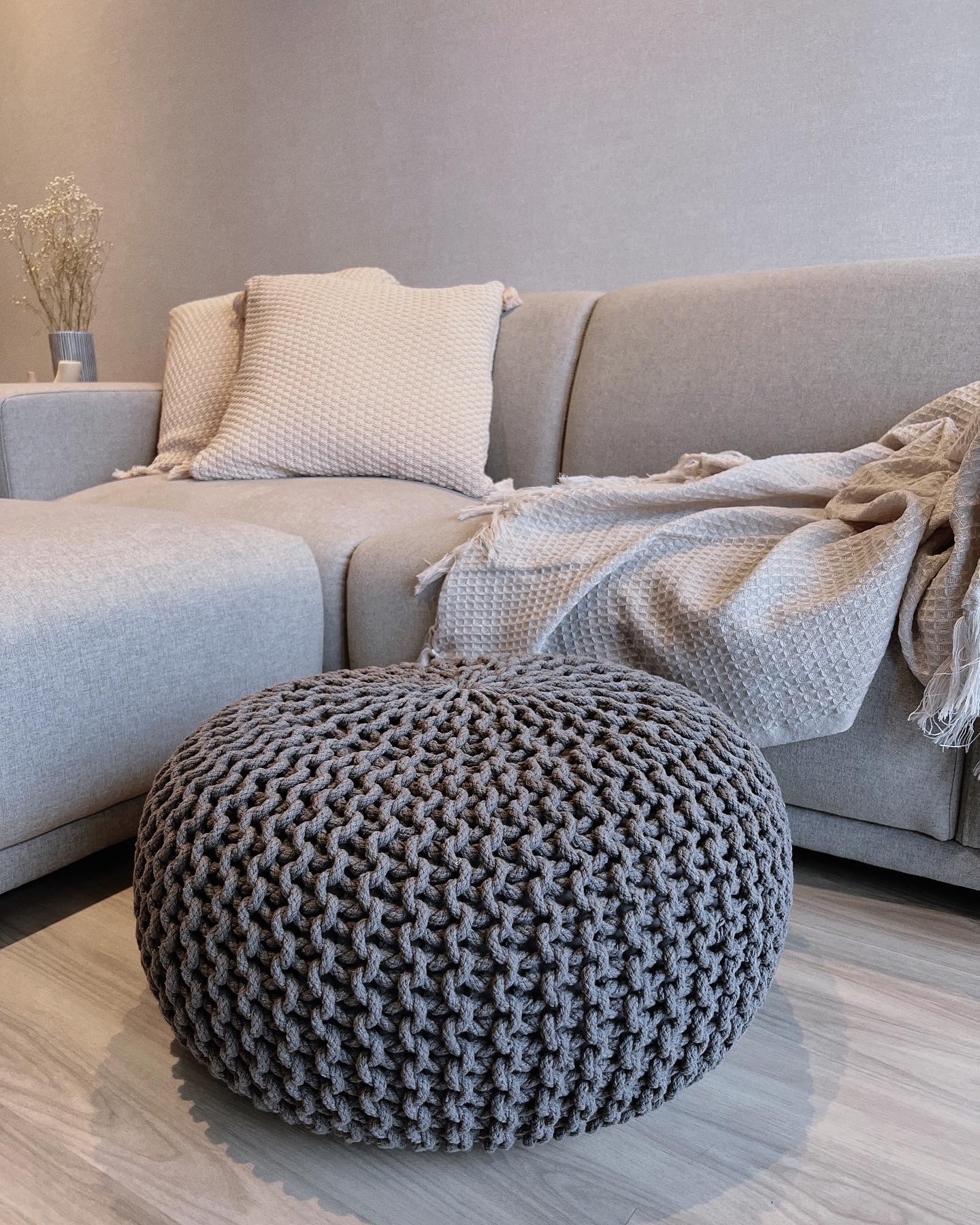 Inside My Scandi-Minimalist 1 Bedder Resale Condominium - Cream-colored sofa, textured cushions, beige throw blanket, gray