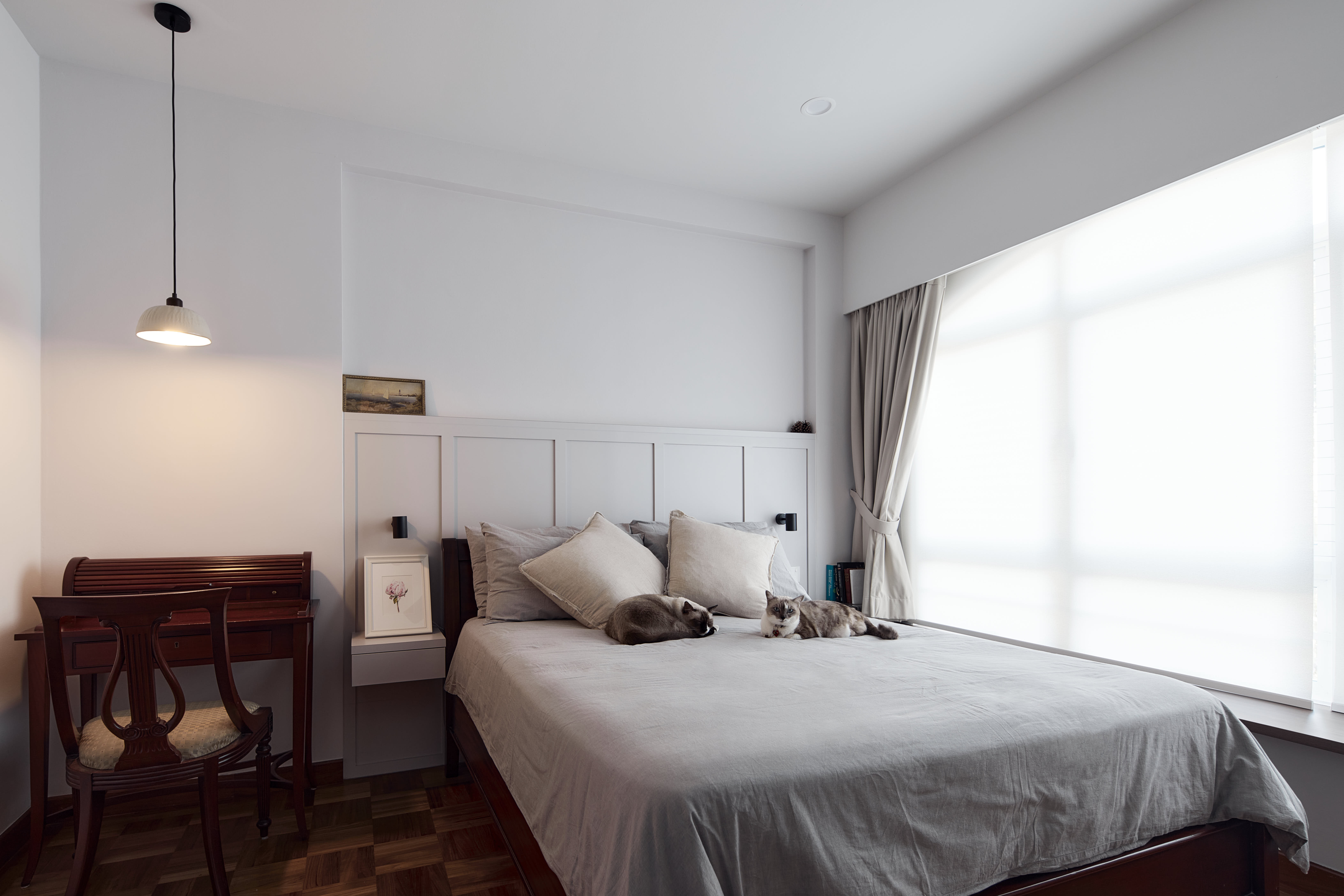 Tranquil Modernity with Rich Wood Flooring - Modern minimalist bedroom, white walls, wooden desk, elegant chair, soft