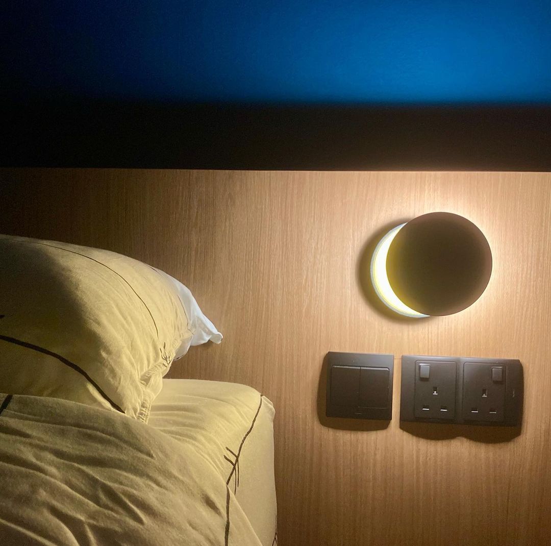 Blue Bliss Bedroom - Wooden wall, modern design, cozy atmosphere, soft lighting, bedside table, nightstand, wall-mounted