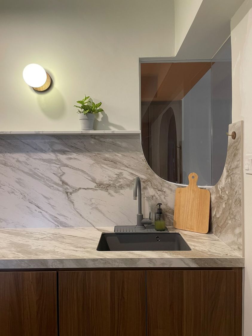 Who says the Kitchen can't be something more?  - Modern kitchen sink, marble countertop, wooden cabinets, sleek design
