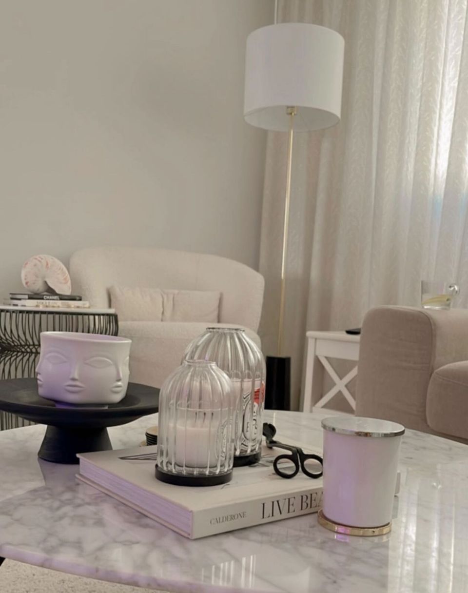 Elegance in Our Simple Cosy Corner - White marble coffee table, minimalist decor, modern art, black and gold candle holder