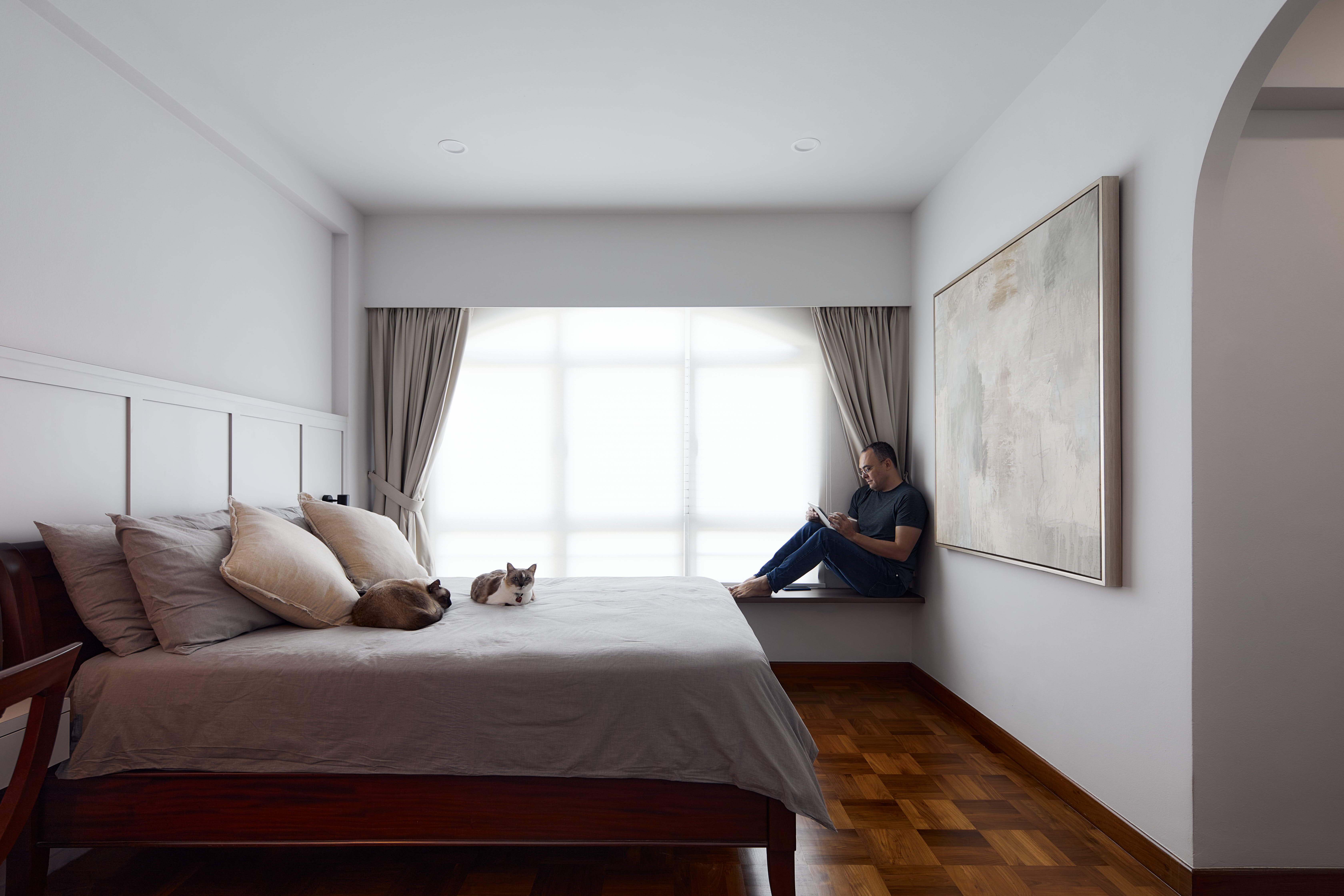 Tranquil Modernity with Rich Wood Flooring - Modern minimalist bedroom, large window with sheer curtains, cozy bed with beige