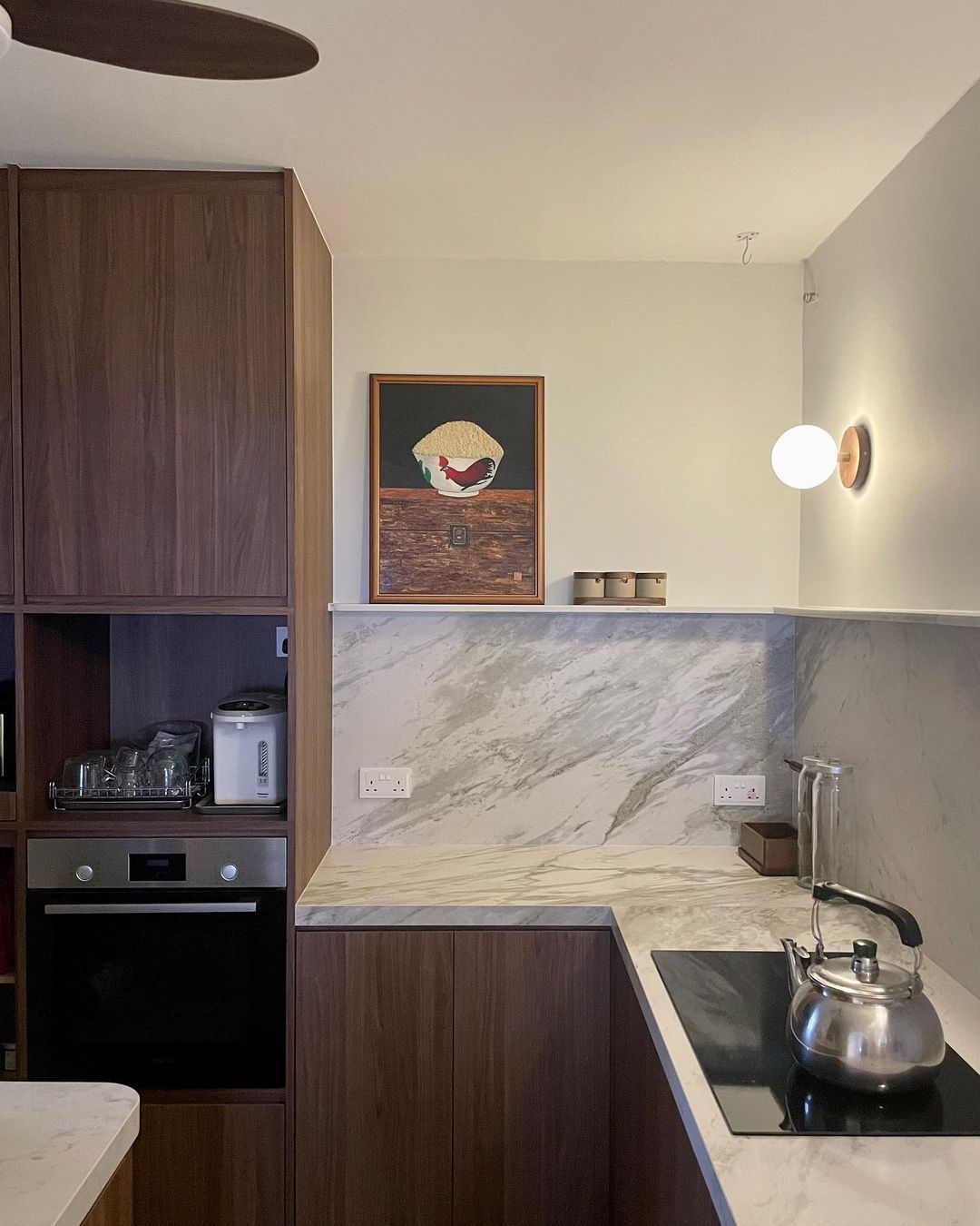 Who says the Kitchen can't be something more?  - Wooden kitchen cabinets, marble backsplash, modern appliances, stainless