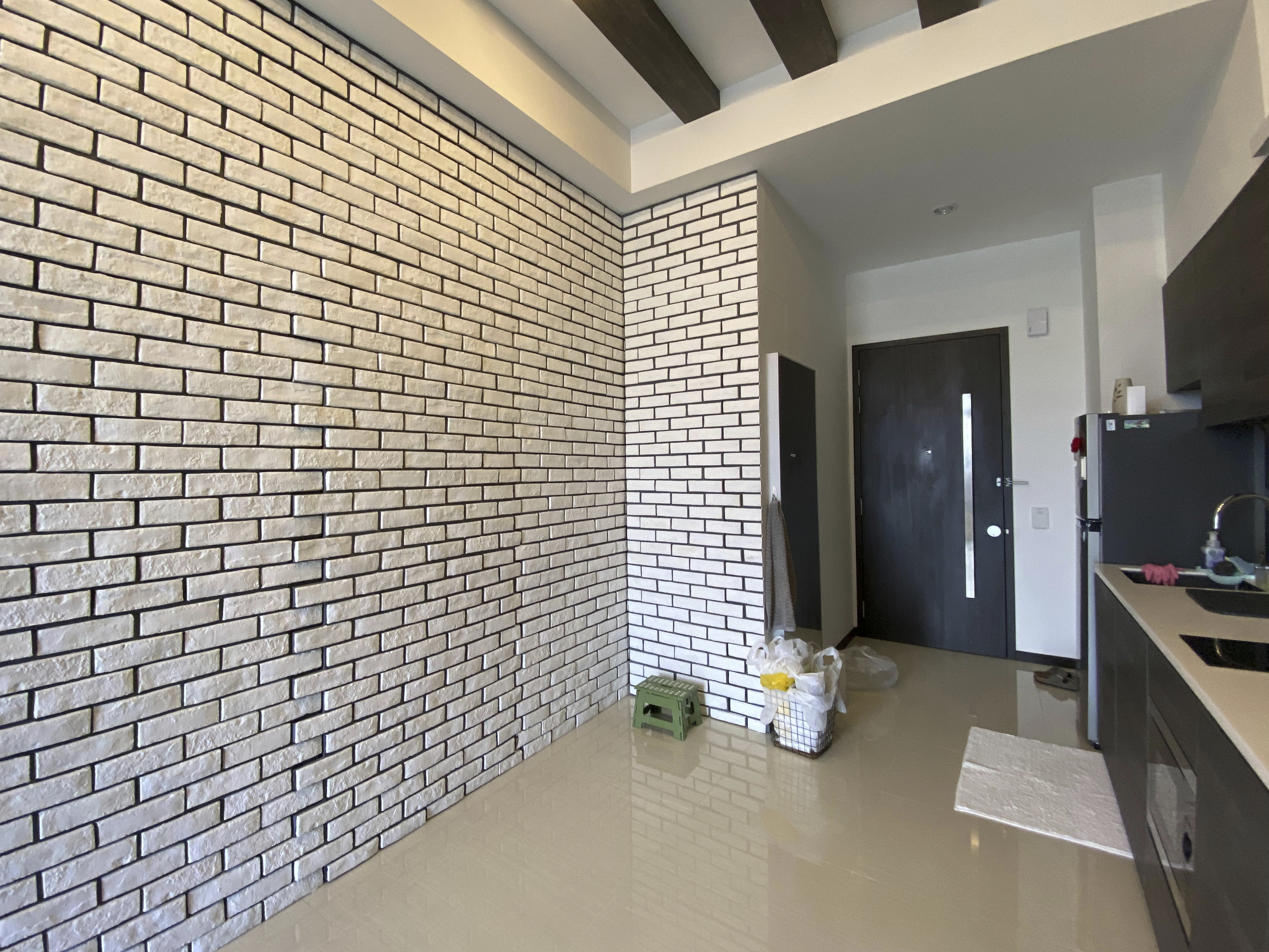 Our Smart Apartment That Might Be Smarter Than Us - White brick wall, modern kitchen, minimalist design, open space, clean