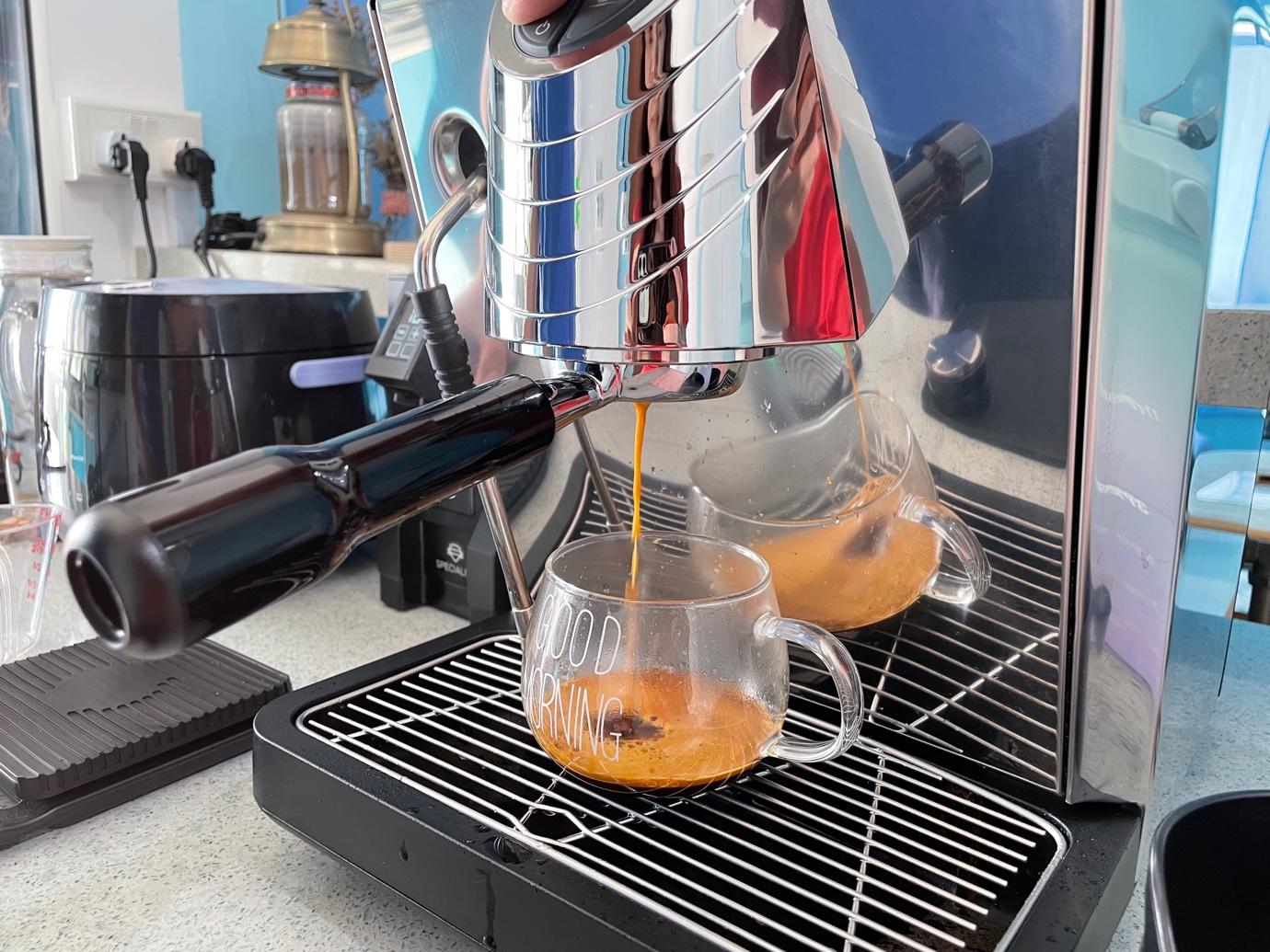 Our Colourful Personalities Imprinted On Our Apartment - Coffee machine dispensing espresso into two glasses, Coffee