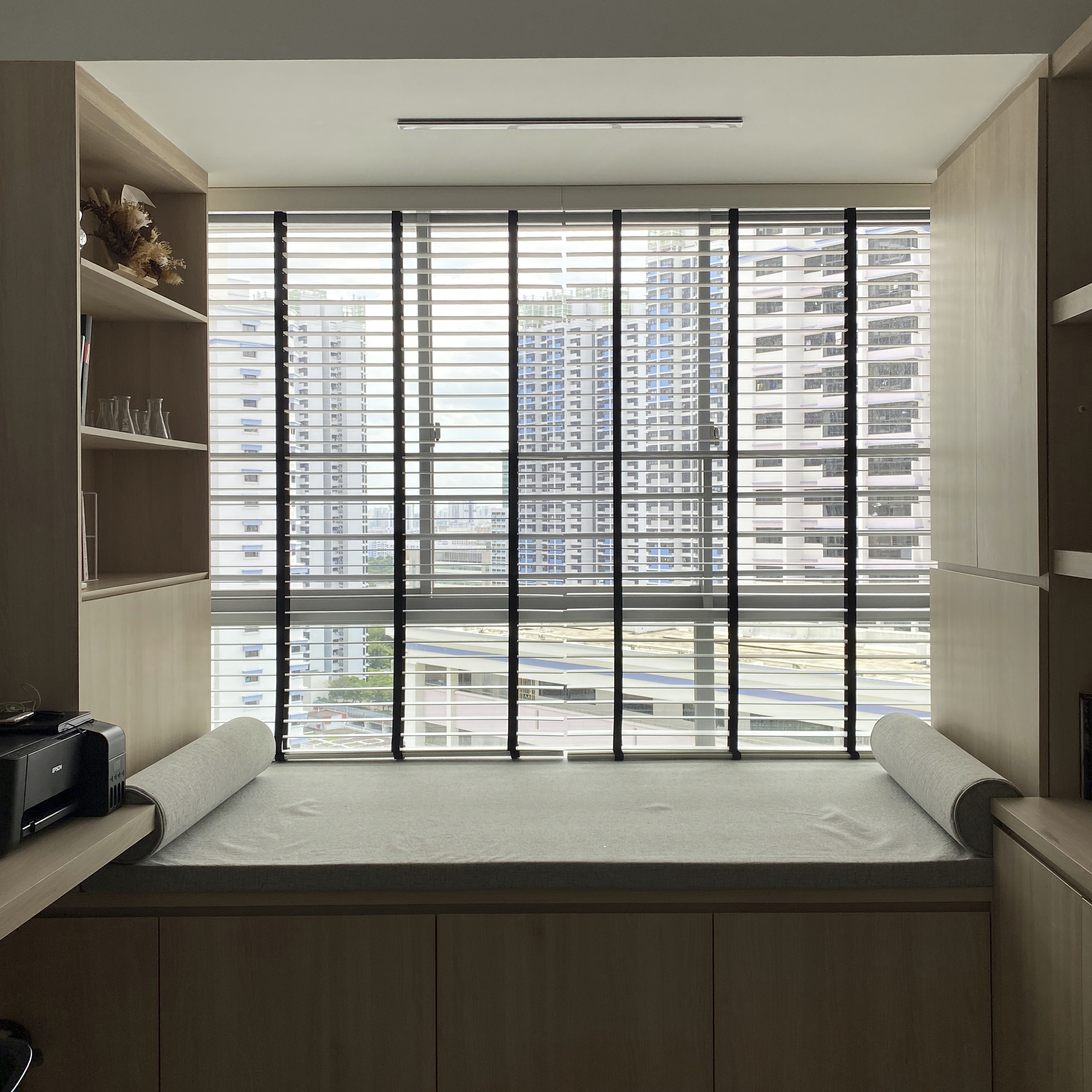 A Minimalist Apartment with an Urban Jungle - Modern minimalist interior, large window with blinds, cityscape view, light